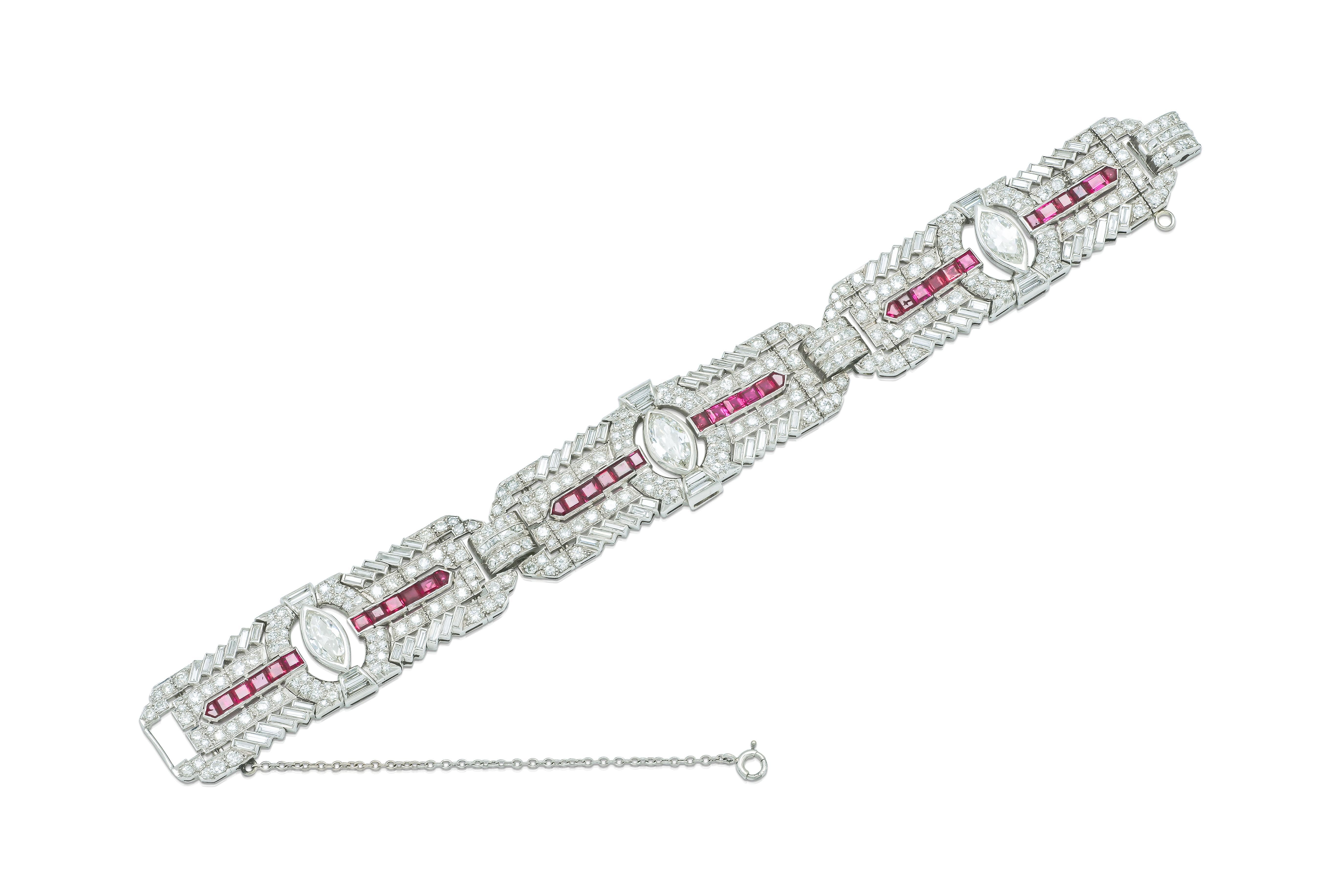 Finely crafted in platinum with 3 Marquise cut Diamonds weighing approximately a total of 4.25 carats, Old European cut Diamonds weighing approximately 13.00 carats, Baguette cut Diamonds weighing approximately 7.00 carats, and Square and Shield cut