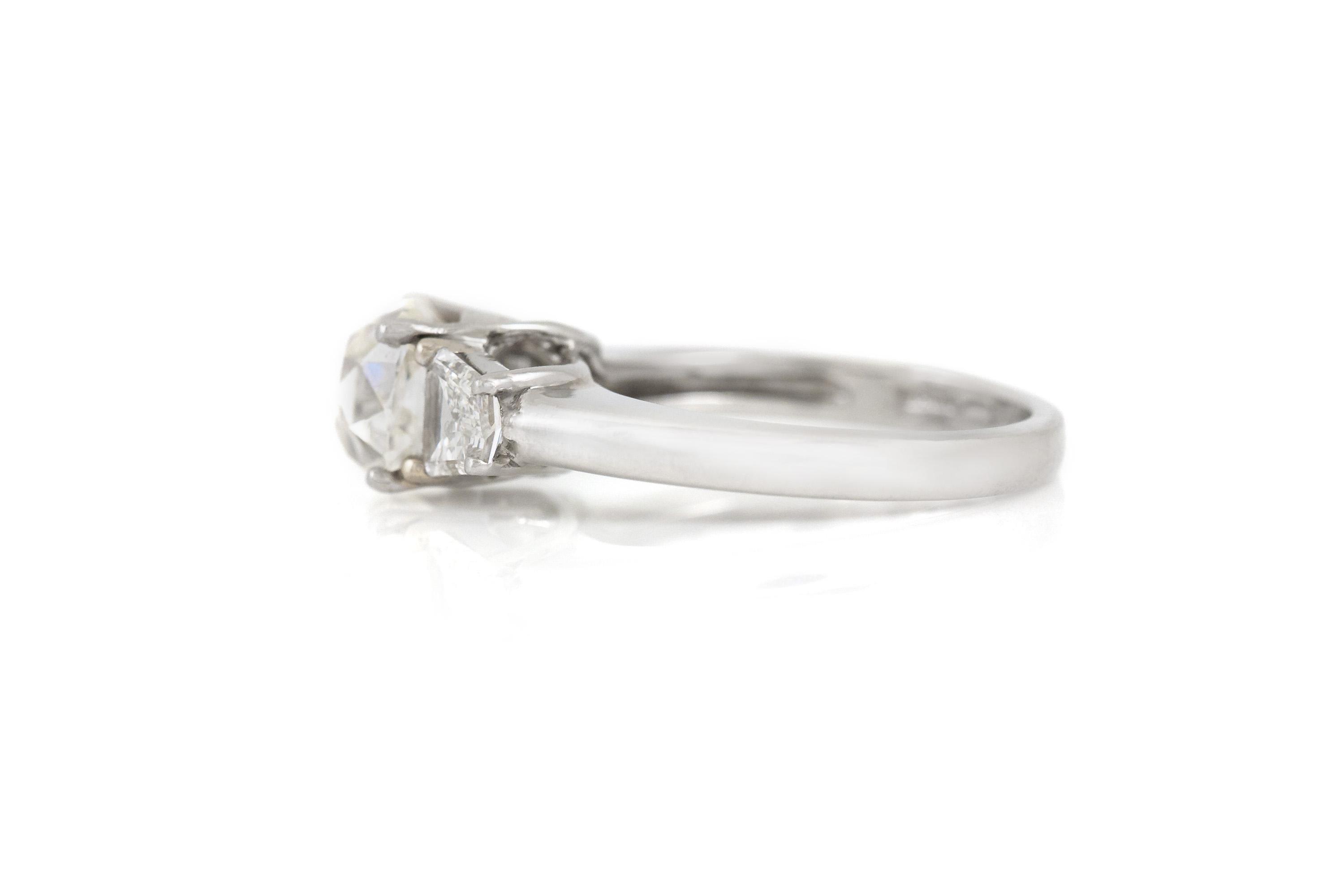Finely crafted in platinum with a GIA certified Old Mine cut Diamond weighing 2.50 carats, I color, VS1 clarity, GIA #12118436.
The ring features 2 Shield cut side Diamonds weighing a total of approximately 0.90 carat.
Circa 1930s
Size 6 1/2,