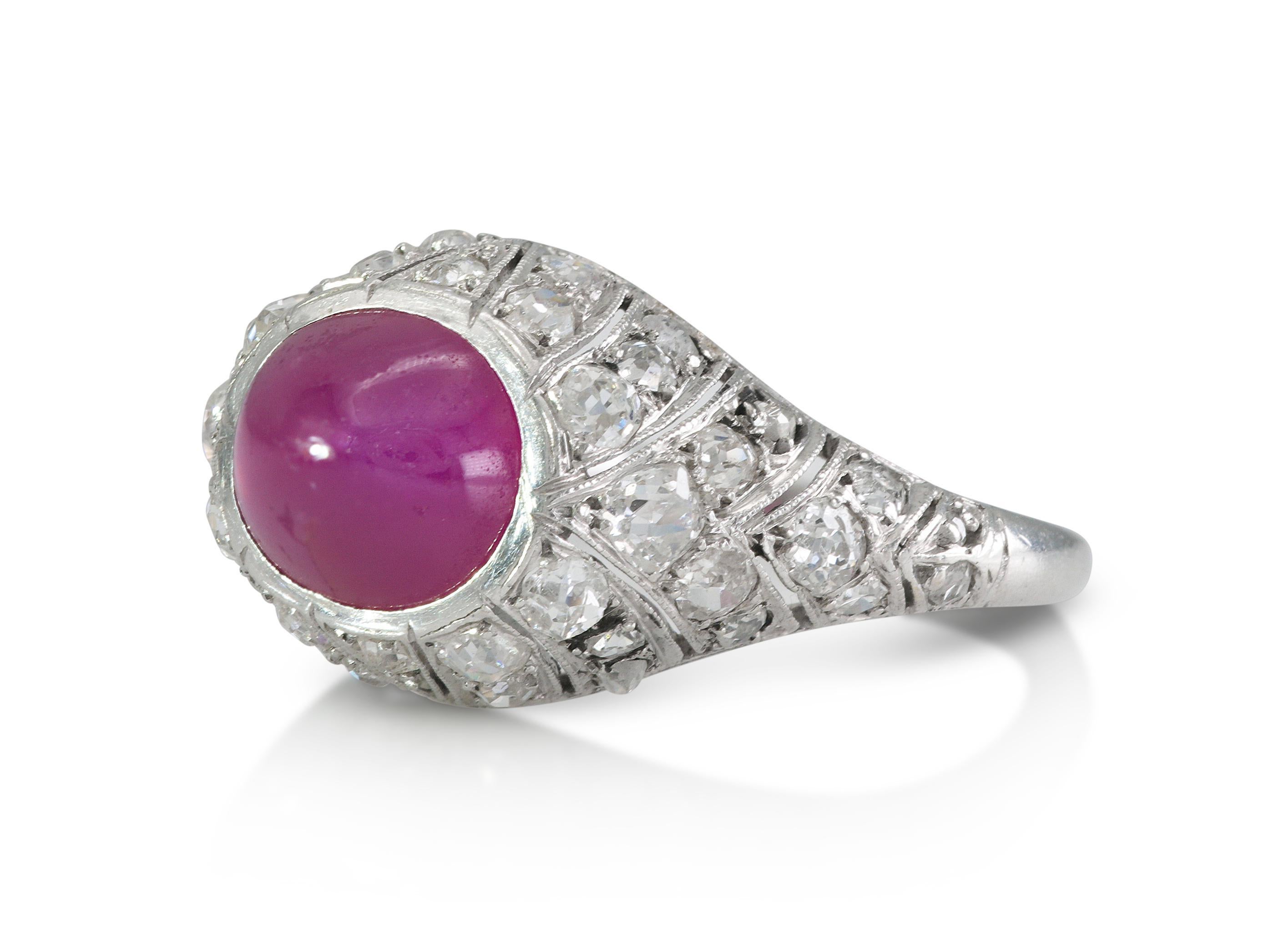 Finely crafted in platinum with a Cabochon Star Ruby weighing approximately 3.00 carats, and small Old European cut Diamonds on the setting weighing approximately a total of 1.60 carats.
Circa 1930s
Size 5 1/2, resizable