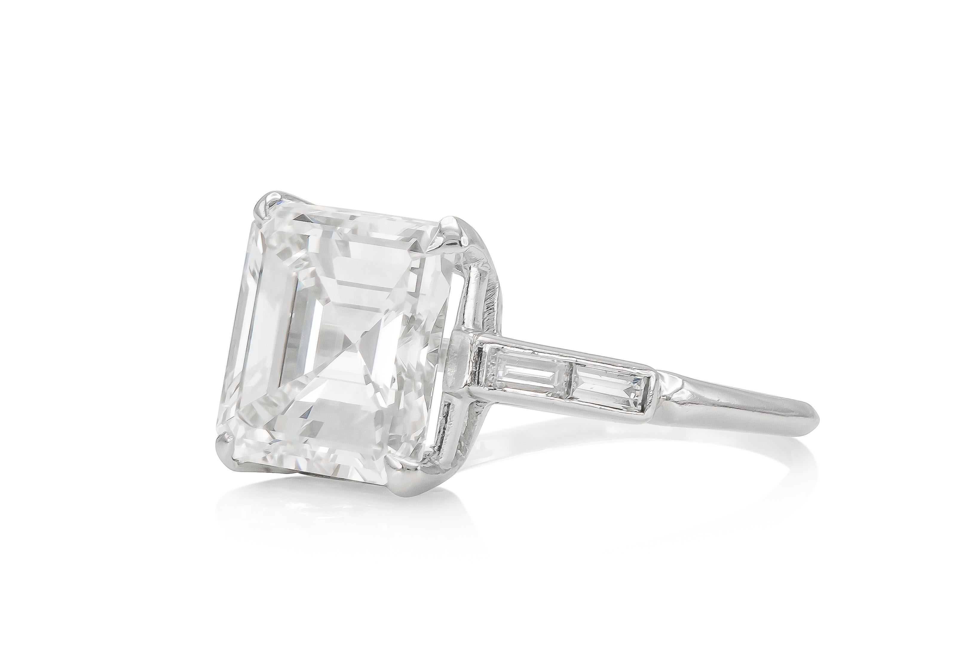 Finely crafted in platinum with a GIA certified Square Emerald cut Diamond weighing 4.00 carats, K color, VS1 clarity, GIA #12729816
The setting features four Baguette cut Diamonds weighing approximately a total of 0.40 carats.
Circa 1930s
Size 6