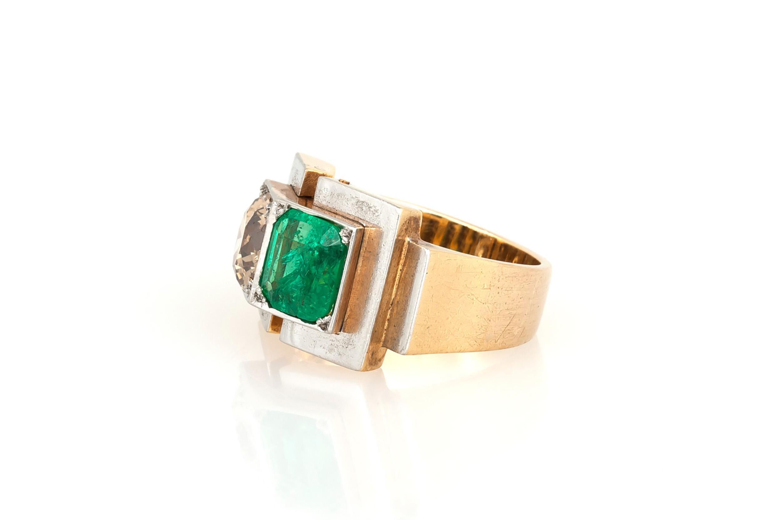 Finely crafted in 18k yellow and white gold with an Old European cut Champagne Diamond weighing approximately 1.50 carats and an Emerald cut Emerald weighing approximately 1.30 carats.
Circa 1930s
Size 4 3/4, resizable