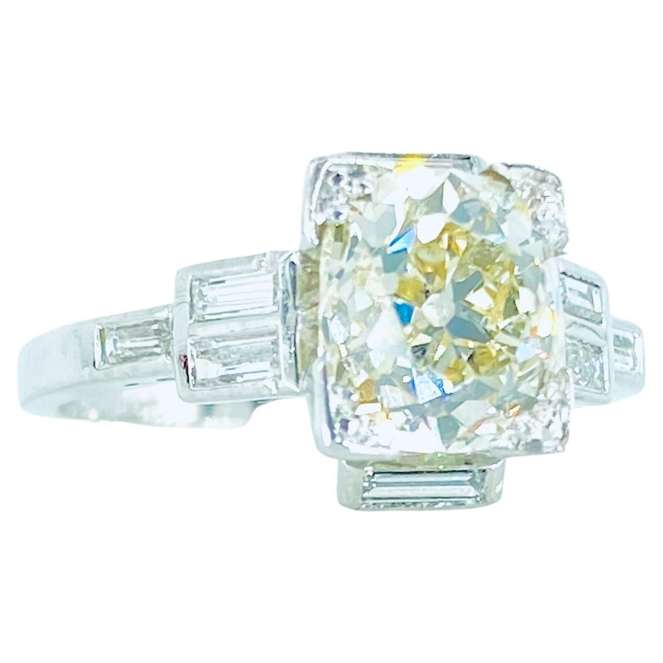 Antique Art Deco 1.94 Carat Natural Old Mine White Diamond Engagement Ring. 

Natural Center Old Mine Cut White Diamond: 1.53cts 
Color: J/K
Clarity: SI
Total # Of Stones: 1 
Cut: Old Mine (7.24x6.36mm) 

Natural Side Baguette Cut White Diamonds: