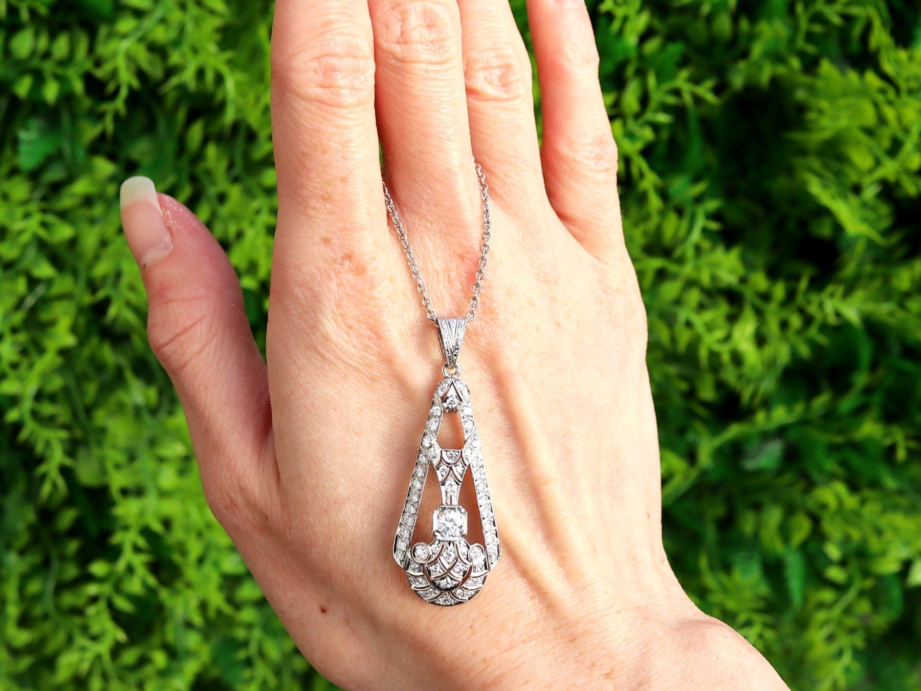 A stunning, fine and impressive antique 2.20 carat diamond and 14 karat white gold Art Deco pendant; part of our diverse antique diamond jewelry and estate jewelry collections.

This stunning, fine and impressive diamond pendant has been crafted in