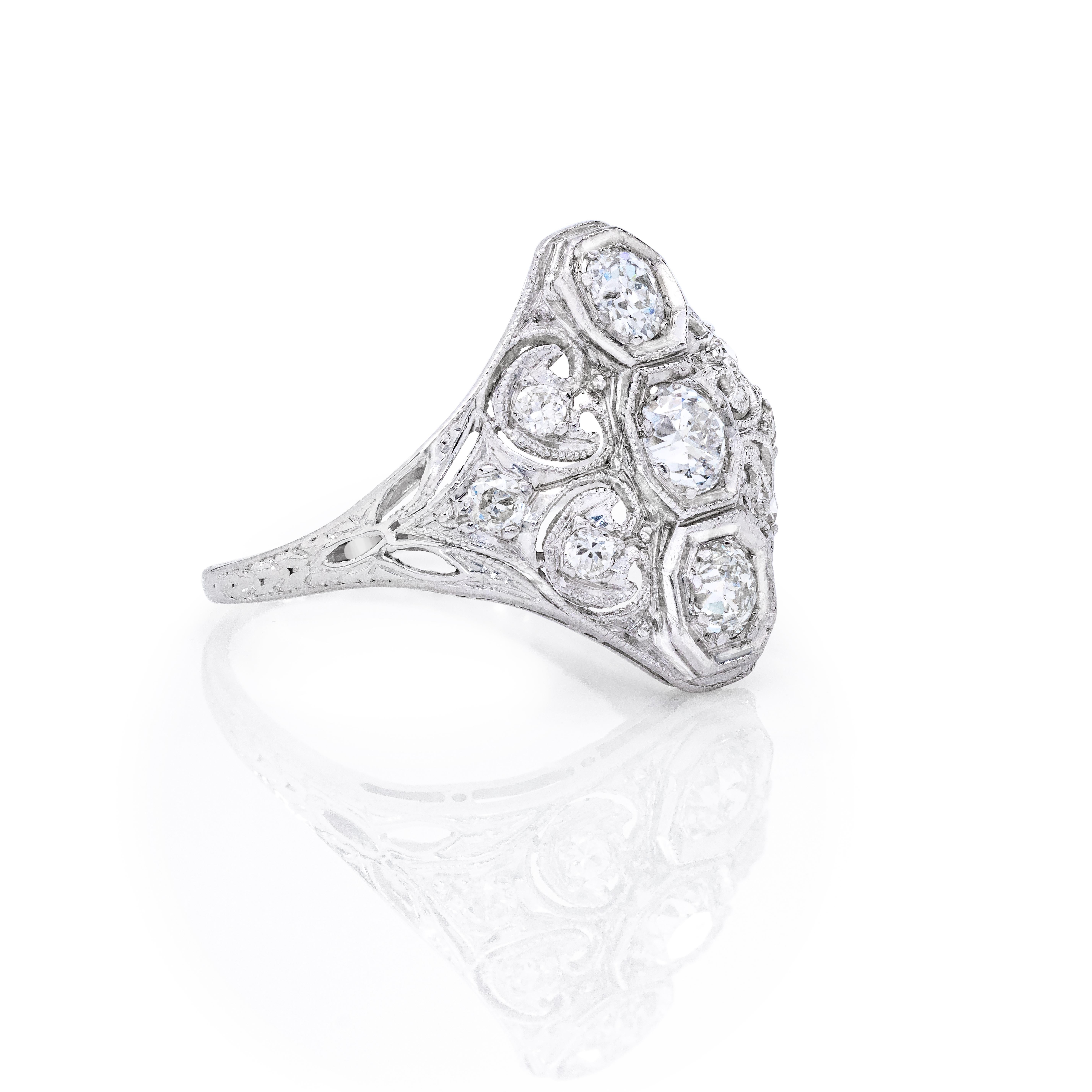 This is a gorgeous and neverendingly stylish ring that is incredibly comfortable to wear.

Ring Details:

3/4 Carat of Diamonds
Set in Platinum
Overall weight:  3.2 grams

Measurements:  16.4 mm down the finger

Ring Size:  5 4/3
*Resizable upon