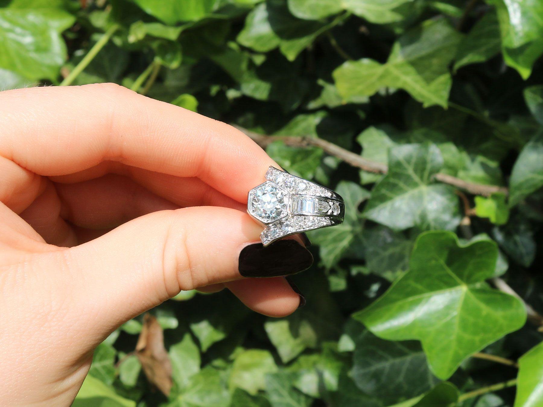 A stunning antique Art Deco 3.24 carat diamond and platinum cocktail ring; part of our diverse antique jewelry and estate jewelry collections.

This stunning, fine and impressive Art Deco ring has been crafted in platinum.

The asymmetric and