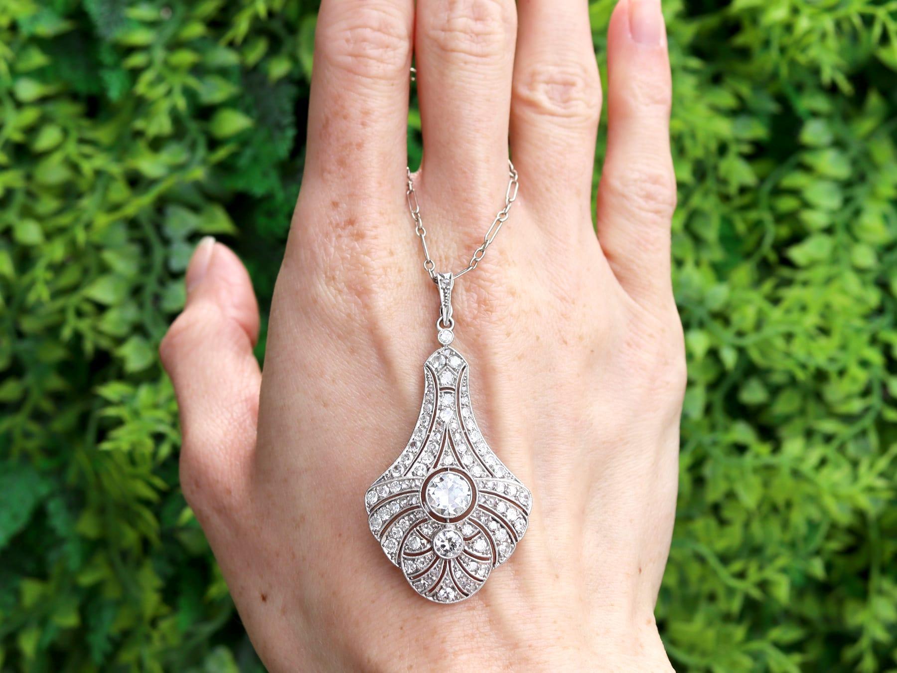 A stunning, fine and impressive antique Art Deco 3.51 carat diamond and 18 karat white gold, platinum set pendant with a 9 karat white gold chain; part of our 1920s jewelry collection.

This stunning, fine and impressive antique diamond pendant has