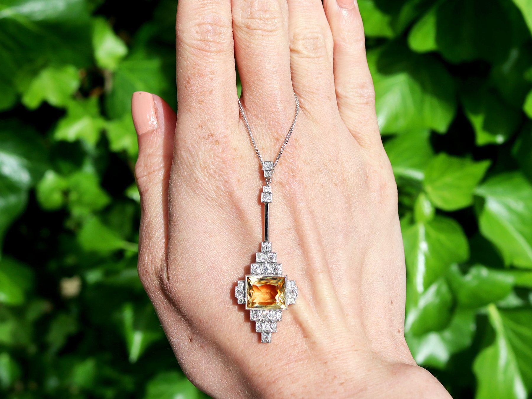 A stunning, fine and impressive 4.20 carat citrine and 0.70 carat diamond, 18ct white gold and platinum Art Deco drop pendant; part of our diverse antique jewellery and estate jewelry collections

This stunning, fine and impressive antique pendant