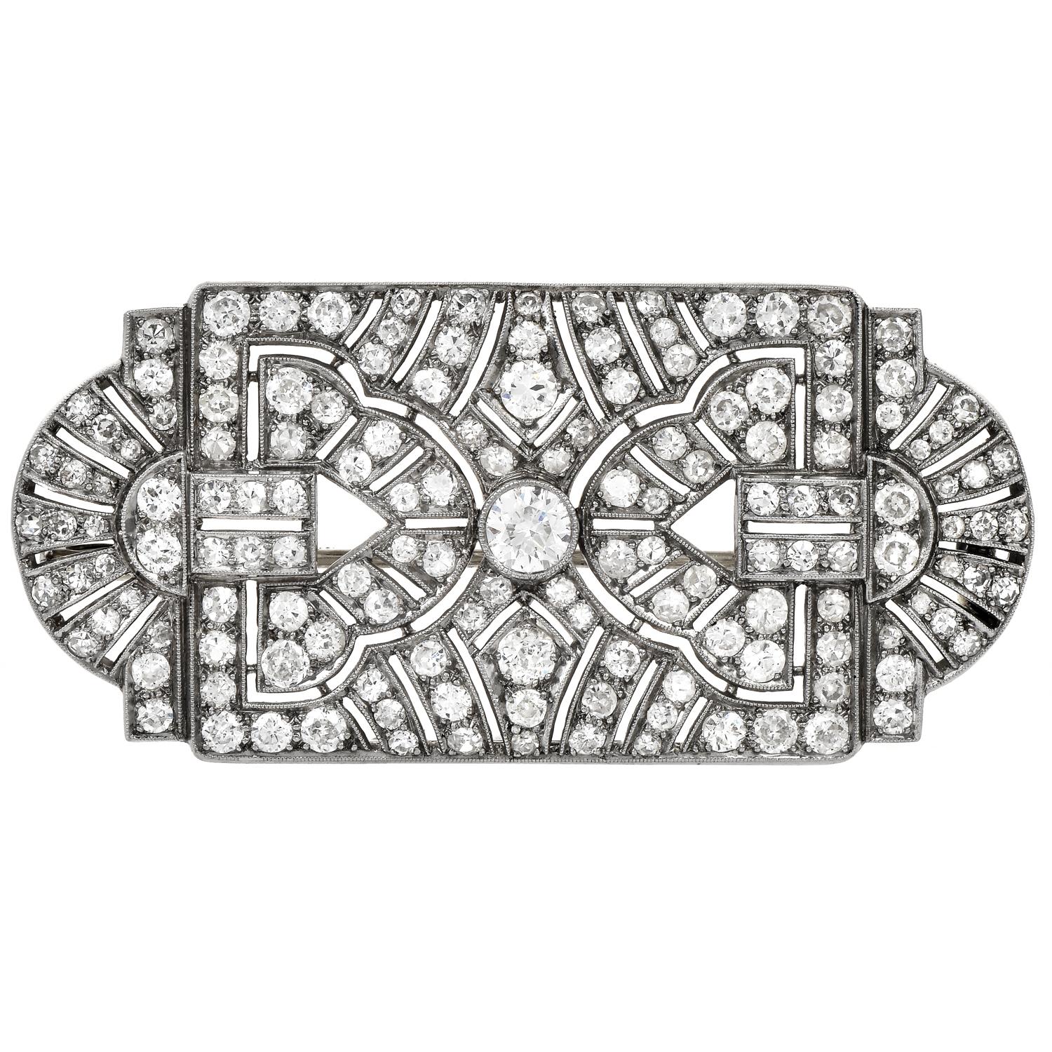 An Exquisite Vintage Art Deco Diamond Platinum Brooch Pin,

Dazzle yourself with the sparkle on this exquisite piece with Icy White Diamonds.

Exquisitely crafted in solid platinum, the open pattern is created by Genuine Diamonds.

Genuine Round Cut