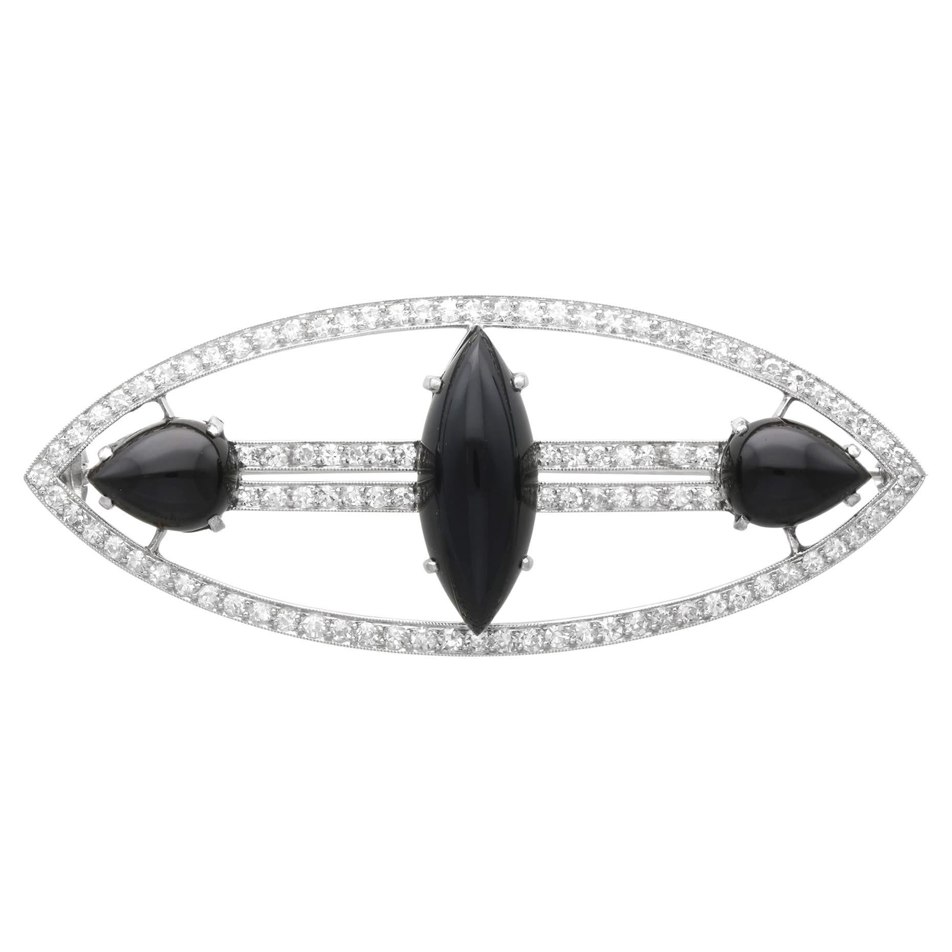 Antike Art Deco 7,50 Karat Onyx 3,20 Karat Diamant, Platin Brosche CIRCA 1920