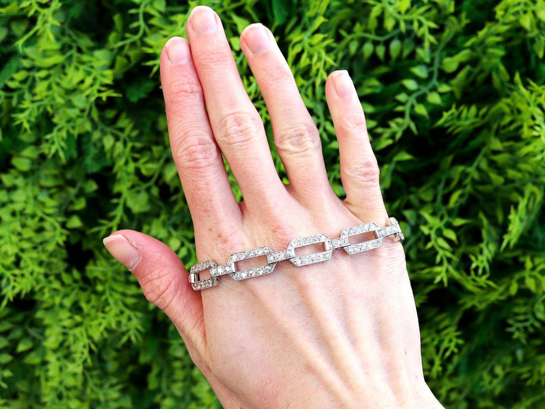 A stunning, fine and impressive antique 7.80 carat diamond and platinum Art Deco bracelet; part of our diverse antique jewelry and estate jewelry collections.

This stunning, fine and impressive antique diamond bracelet has been crafted in
