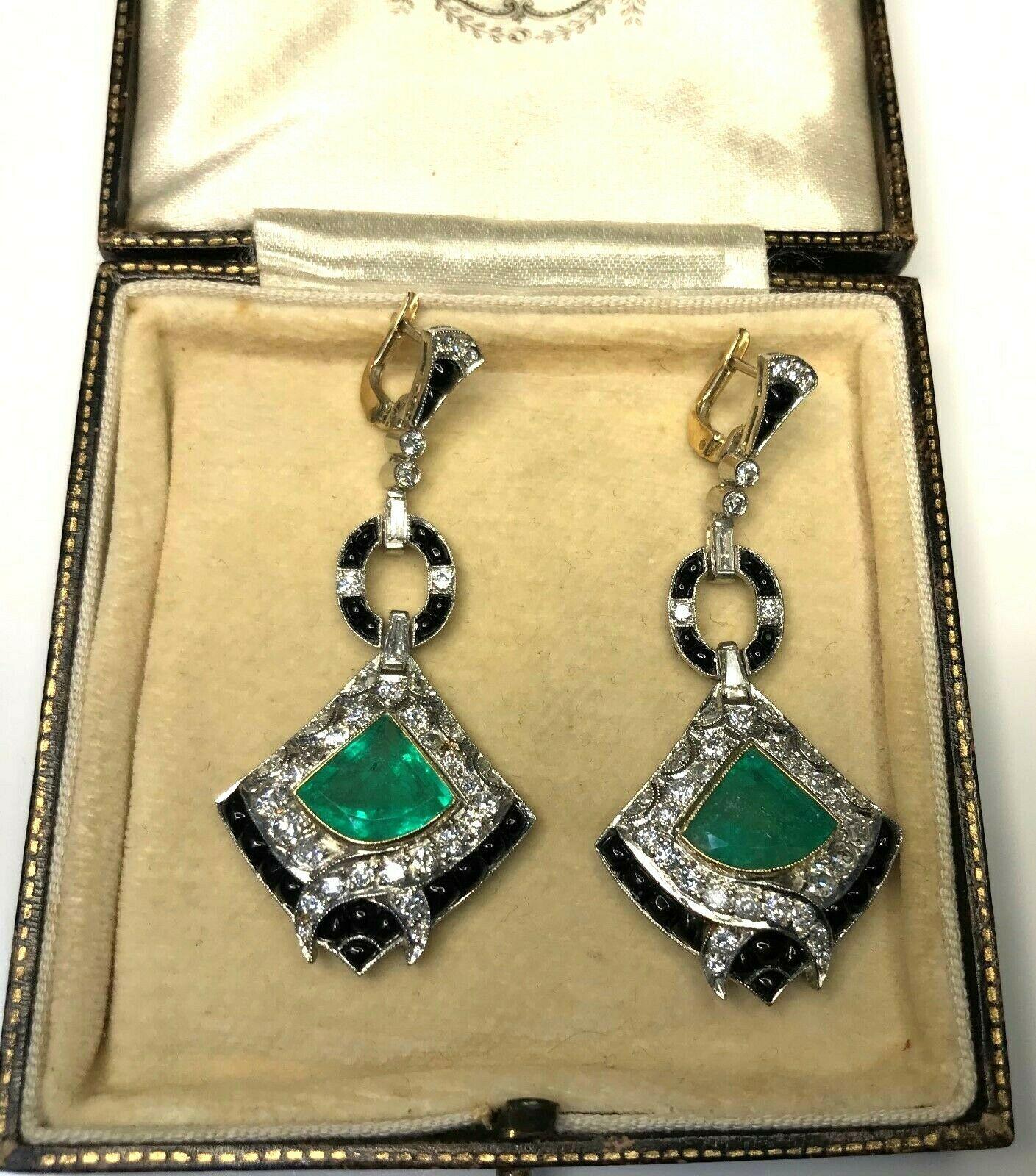 Estate Antique Art Deco 8.58 CTW Diamond Colombian Emerald Onyx Platinum Dangle Earrings


There Are Eighty Eight Round Old European Cut Natural Diamonds, Weighing Approximately 2.58 Carat Total Weight.
Color Grade: G-H
Clarity Grade: VS/SI1

Two