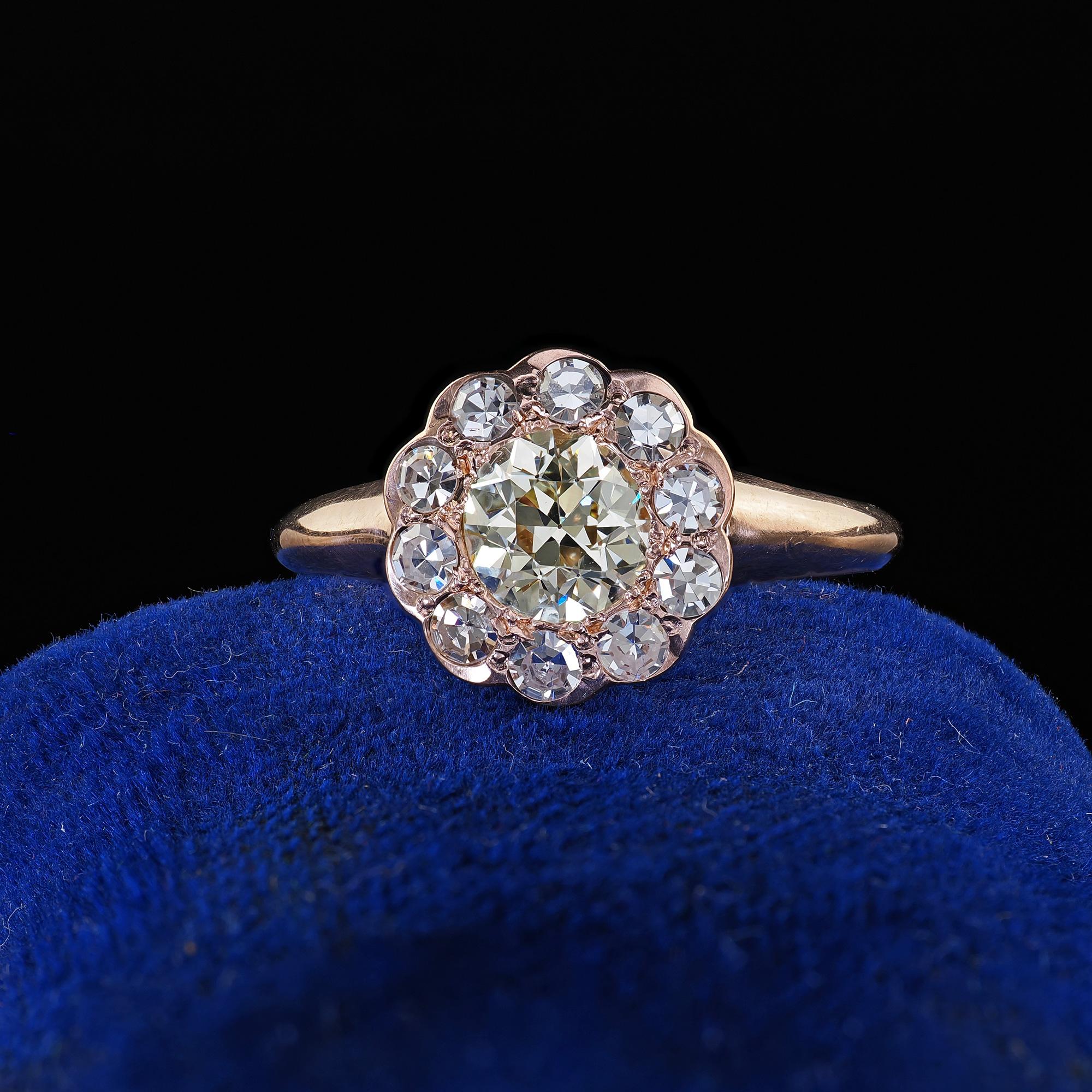 Beautiful Antique Art Deco 9K Rose Gold Old Cut Diamond Cluster Engagement Ring. This beautiful Art Deco old cut diamond cluster engagement ring is crafted in 9k rose gold. This gorgeous ring features a yellow old European cut diamond in the center