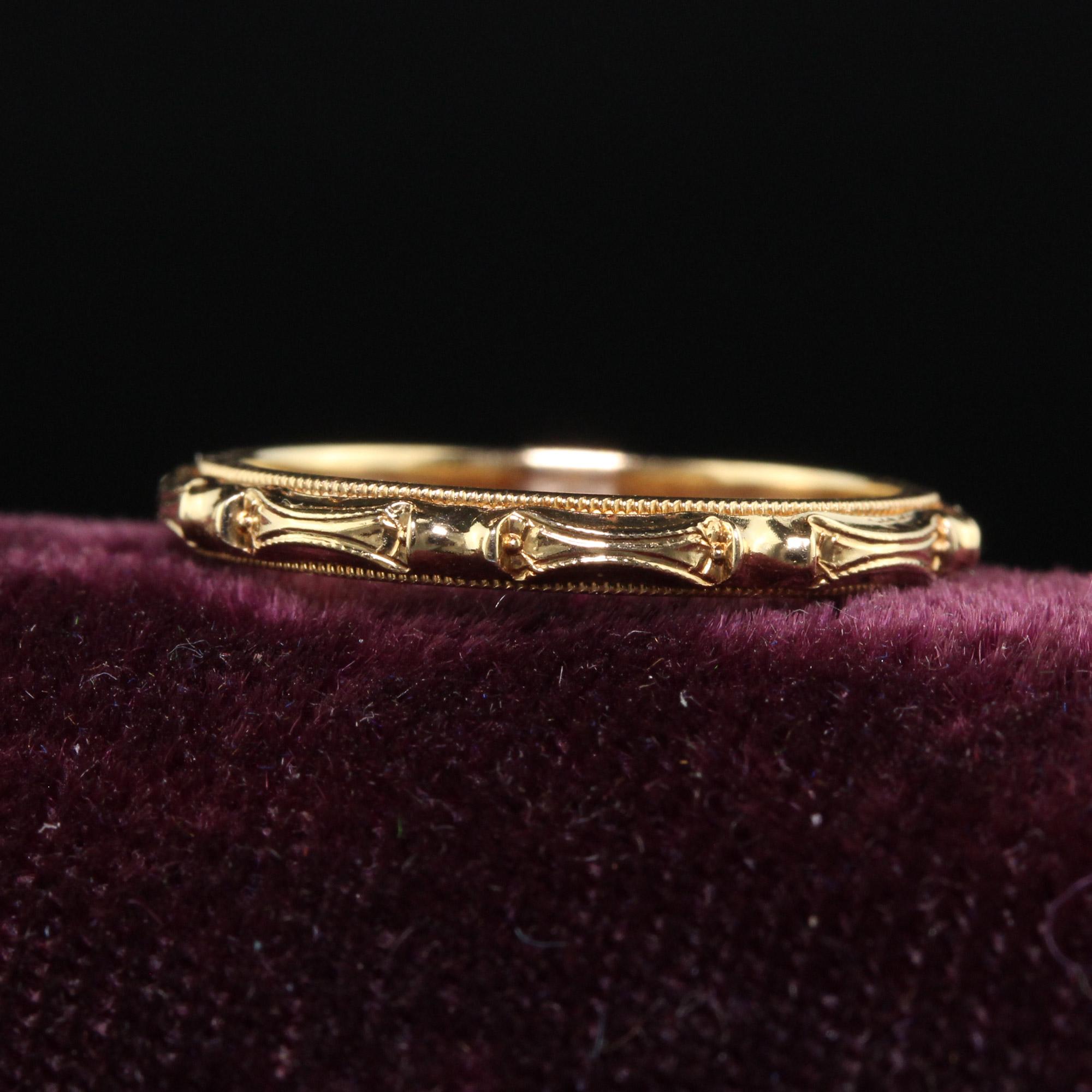 Beautiful Antique Art Deco Art Carved 14K Yellow Gold Engraved Wedding Band - Size 5. This classic wedding band is crafted in 14k yellow gold. The band is deeply engraved around the entire ring and is in wonderful condition. The ring sits low on the