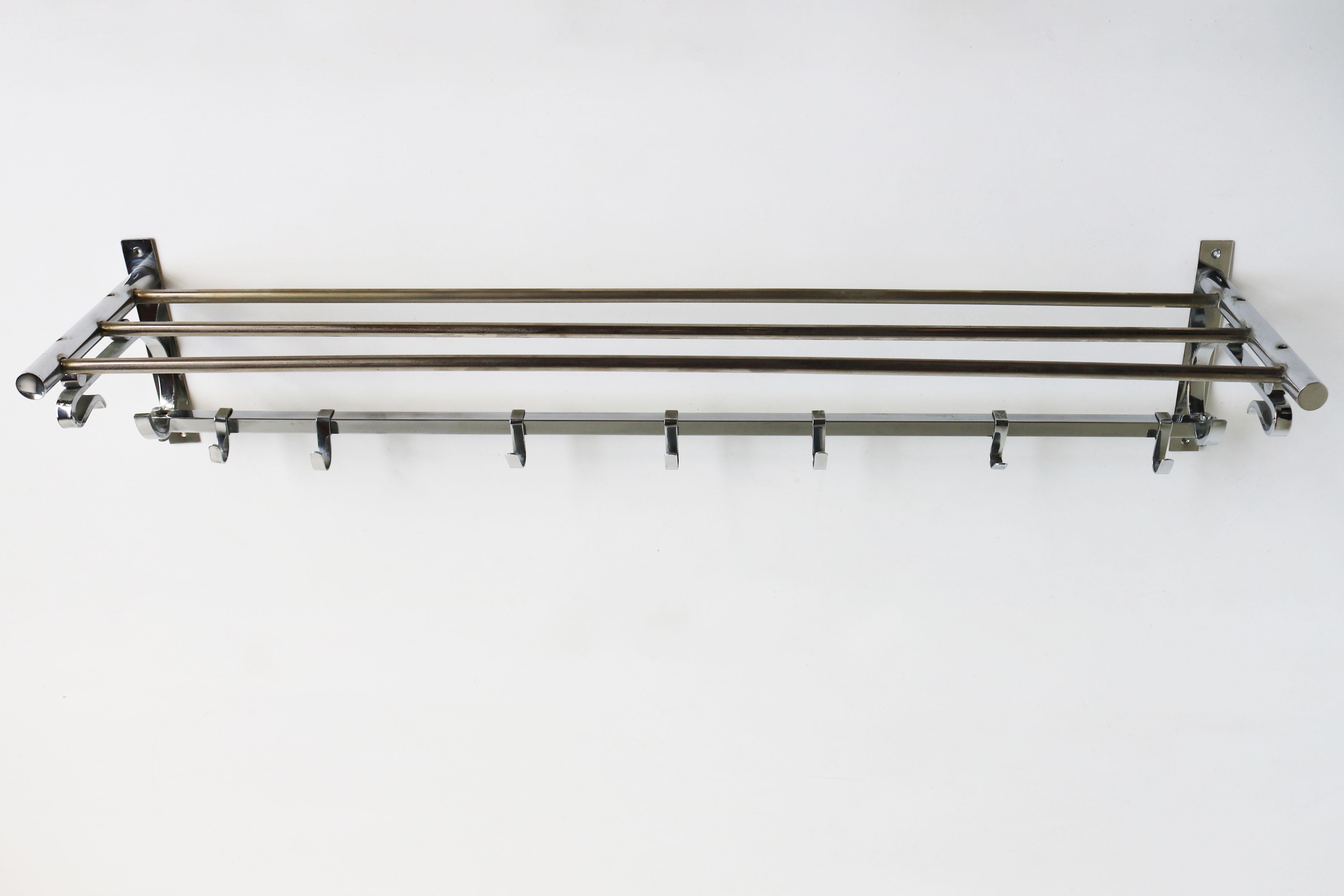 Gorgeous early Art Deco / Late Art Nouveau coat rack in chrome from France 1920. 
The design of this coat rack dates from the shift of Art Nouveau to Art Deco, it has a curved line combined with the straight Art Deco spheres. 
The coat rack has