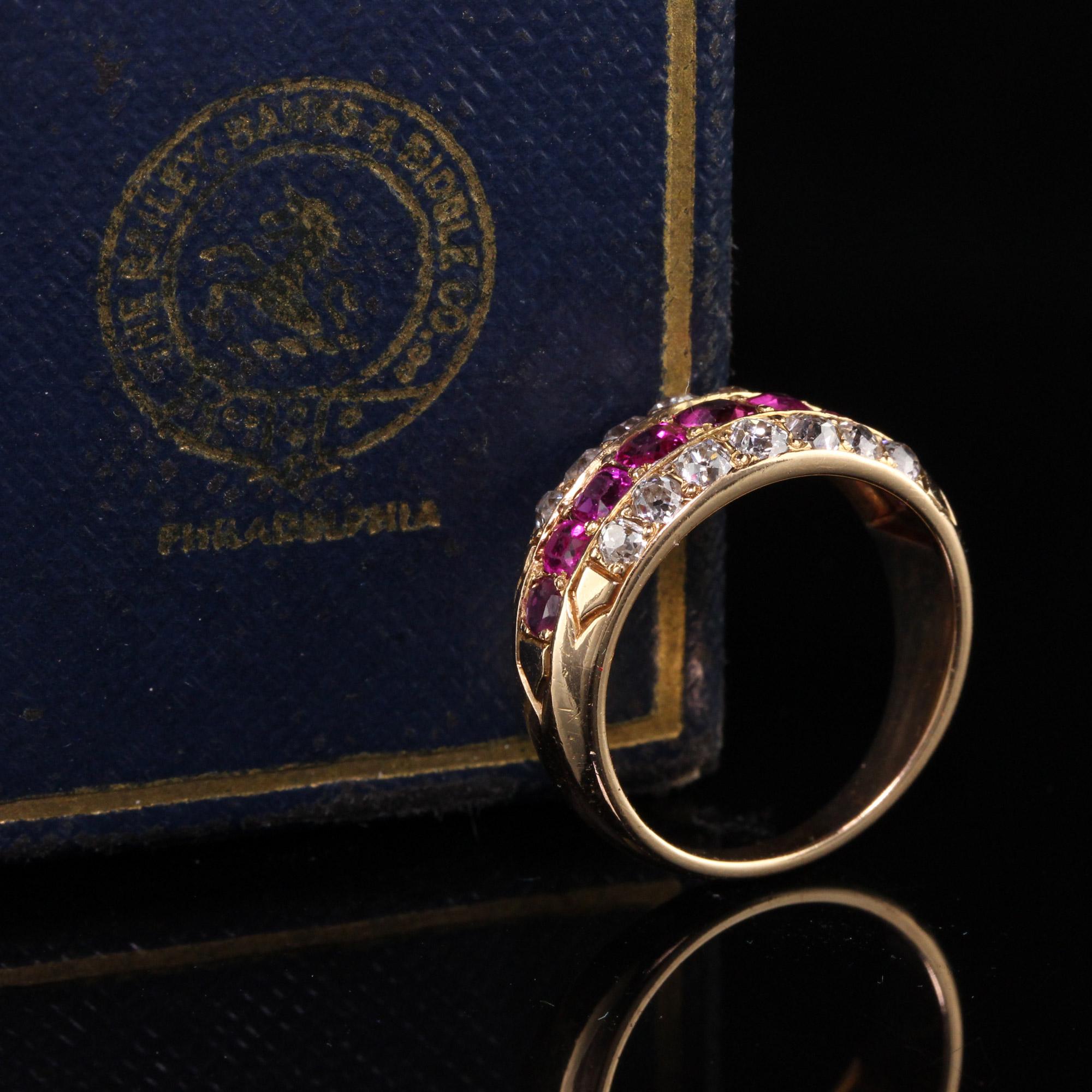 Beautiful Antique Art Deco Bailey Banks and Biddle 18K Rose Gold Diamond and Ruby Band. This incredible ring has a row of beautiful burmese rubies that are nice and bright with 2 rows of chunky old mine cut diamonds above and below in rose