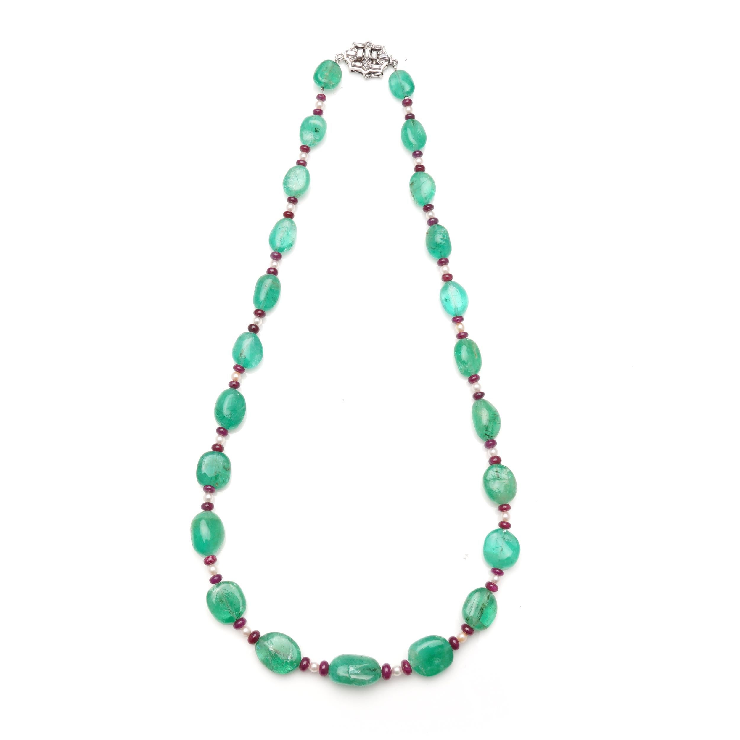 Bead necklace with emeralds, rubellites, and seed pearls with a platinum hidden box clasp. 
The clasp has been tested positive for 950/1000 platinum.

Dimensions:
Necklace full length: 56.7 cm
Widest part width: 1.4 cm
Weight: 53 grams


Cabochon
