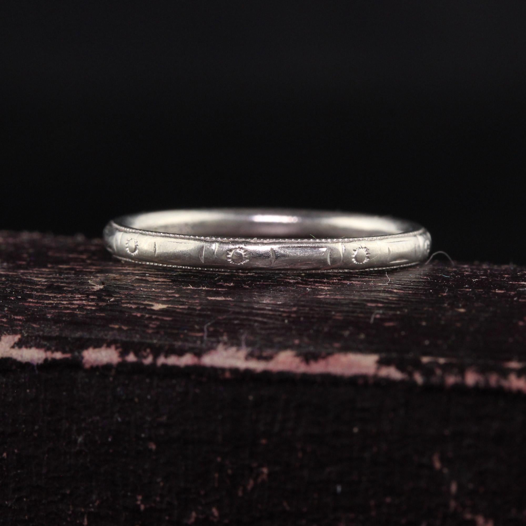 Beautiful Antique Art Deco Belais 18K White Gold Engraved Wedding Band - Size 5. This gorgeous wedding band is crafted in 18k white gold. The band has engravings going around the entire ring and is in great condition.

Item #R1274

Metal: 18K White