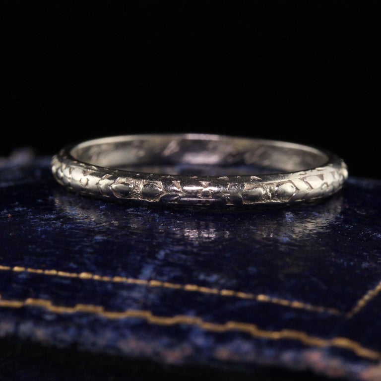 Beautiful Antique Art Deco Belais 18K White Gold Engraved Wedding Band - Size 6. this beautiful wedding band is crafted in 18k white gold. The ring is beautifully engraved on the top and has 