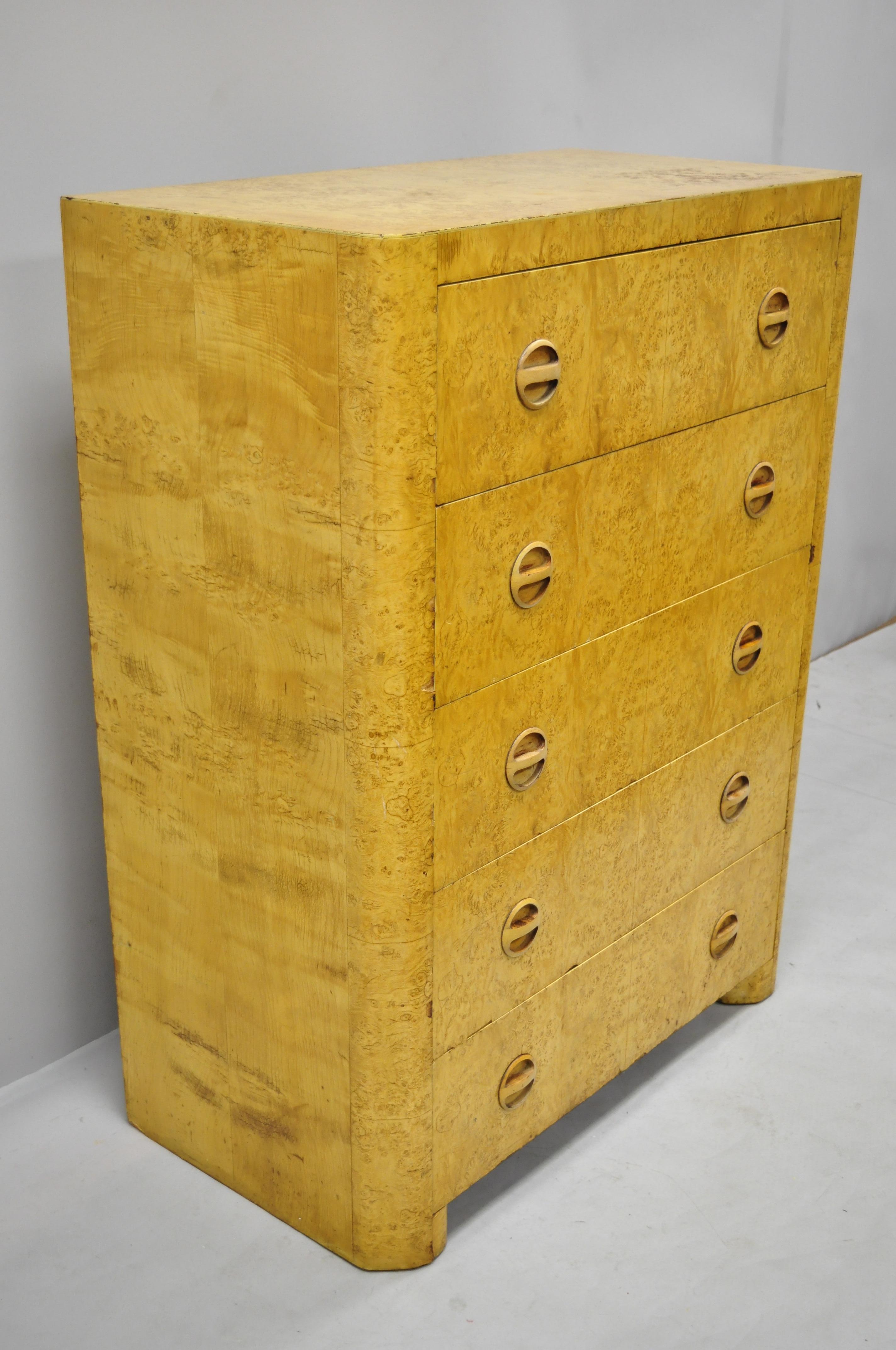 Antique Art Deco bird’s-eye maple tall chest dresser after Gilbert Rohde. Item features sculpted wood pulls, beautiful wood grain, 5 dovetailed drawers, very nice vintage item, circa 1940. Measures: 50