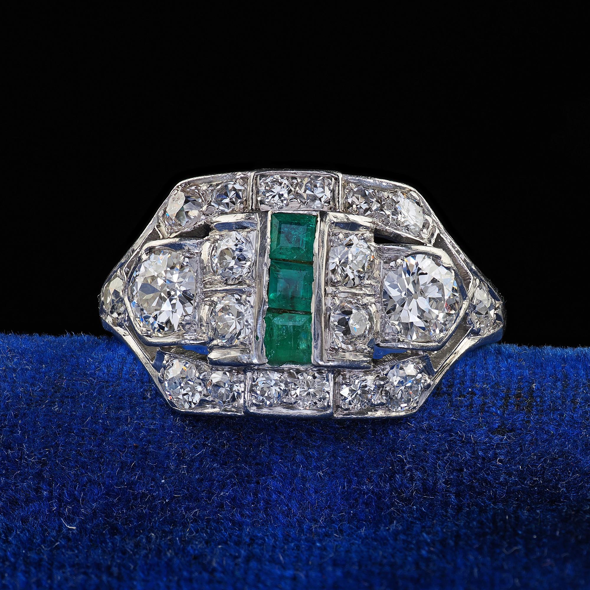 Beautiful Antique Art Deco Birks Platinum Old European Cut Diamond and Emerald Ring. This incredible Art Deco old European cut diamond and emerald ring is crafted in platinum. This ring features beautiful old European cut diamonds set with a row of