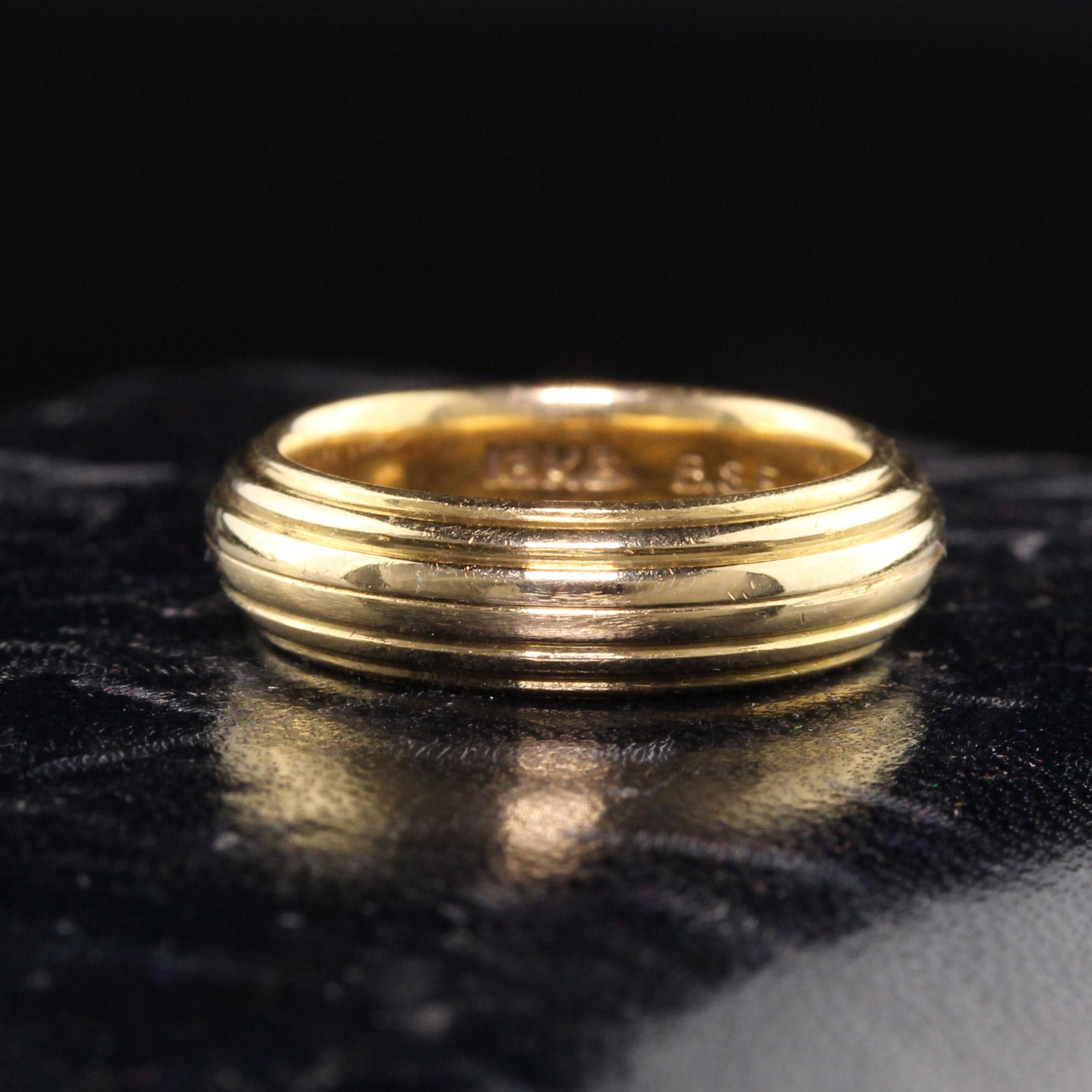 Beautiful Antique Art Deco Black Starr and Frost 18K Yellow Gold Wide Wedding Band. This amazing Black Starr and Frost wedding band is solid and has clean line engravings around the entire ring.

Item #R0975

Metal: 18K Yellow Gold

Weight: 6.4
