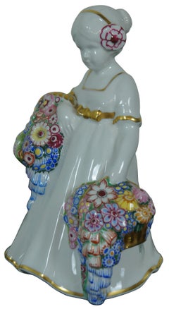 Figurita de porcelana antigua Art Decó Bohemia Pirkenhammer Niña de las flores