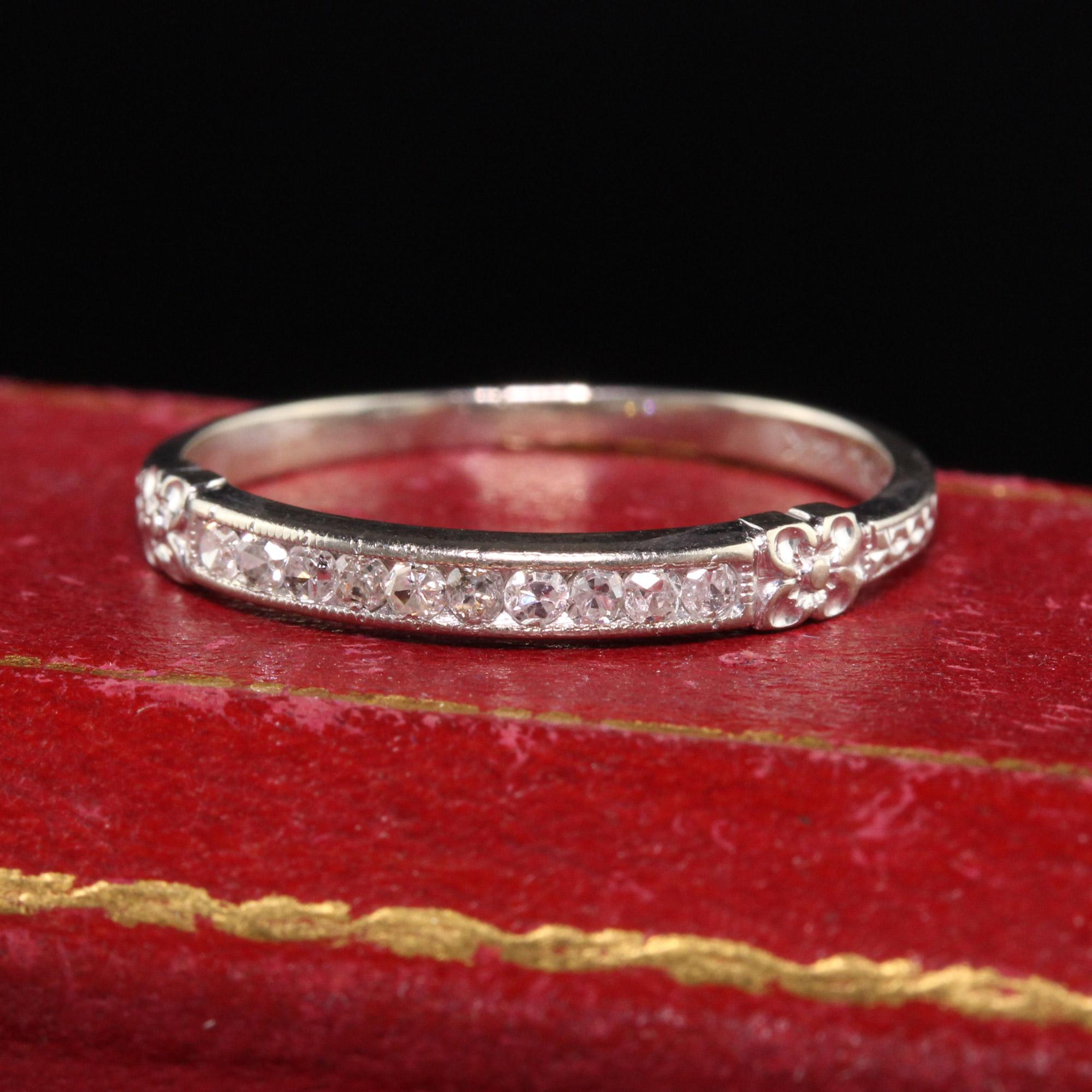 Beautiful Antique Art Deco Bristol 14K White Gold Engraved Diamond Wedding Band. This gorgeous band features single cut diamond on the top with engraved blossom accents on each side. It is in great condition.

Item #R1115

Metal: 14K White