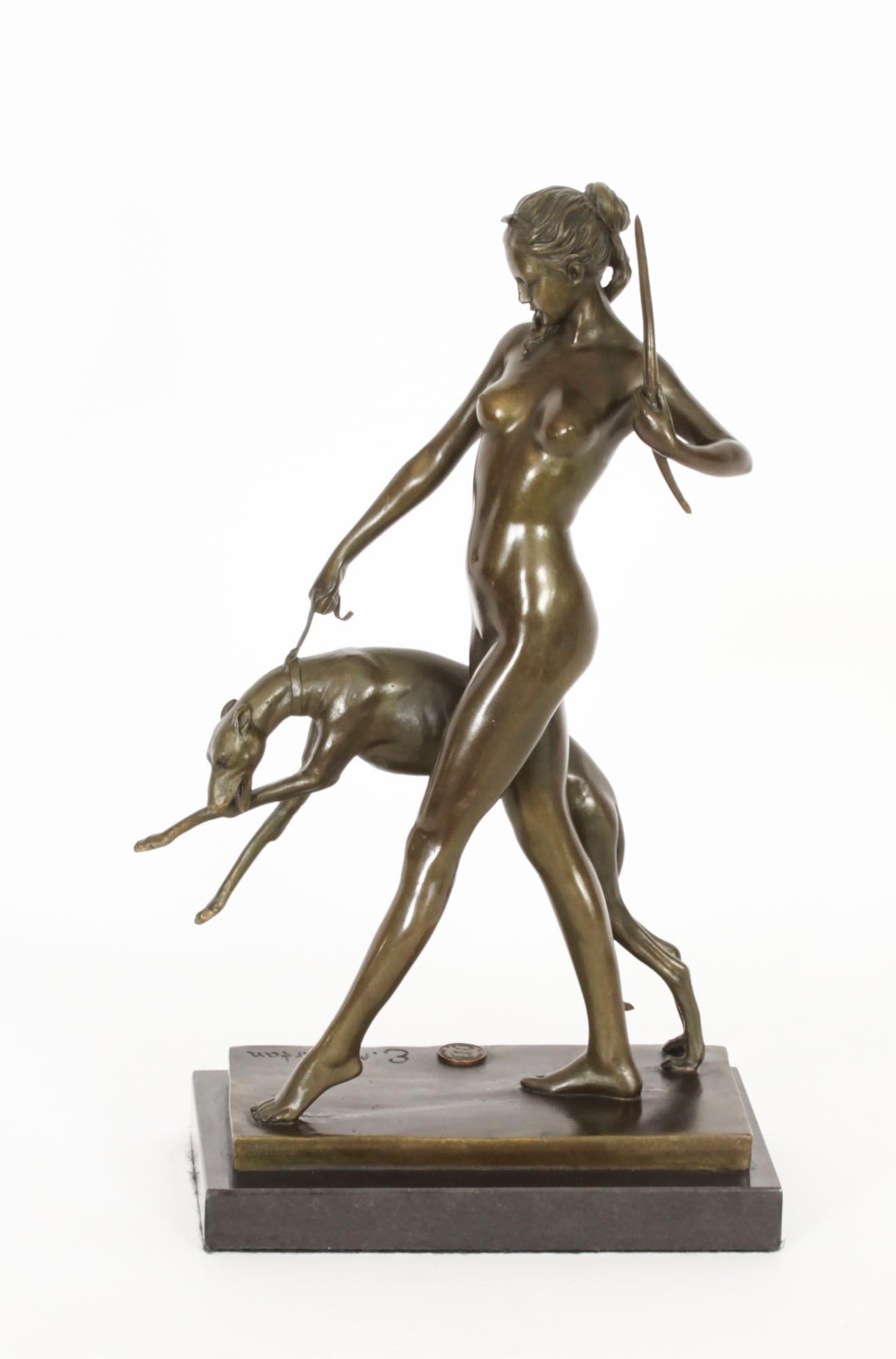 A beautiful Art Deco sculpture of Diana the Huntress with Hound by Edward Francis McCartan (1879-1947) signed by the sculptor and also bearing the stamp of the foundry, Garante de Bronze, Paris, circa 1930 in date.

The sculpture of dark brown