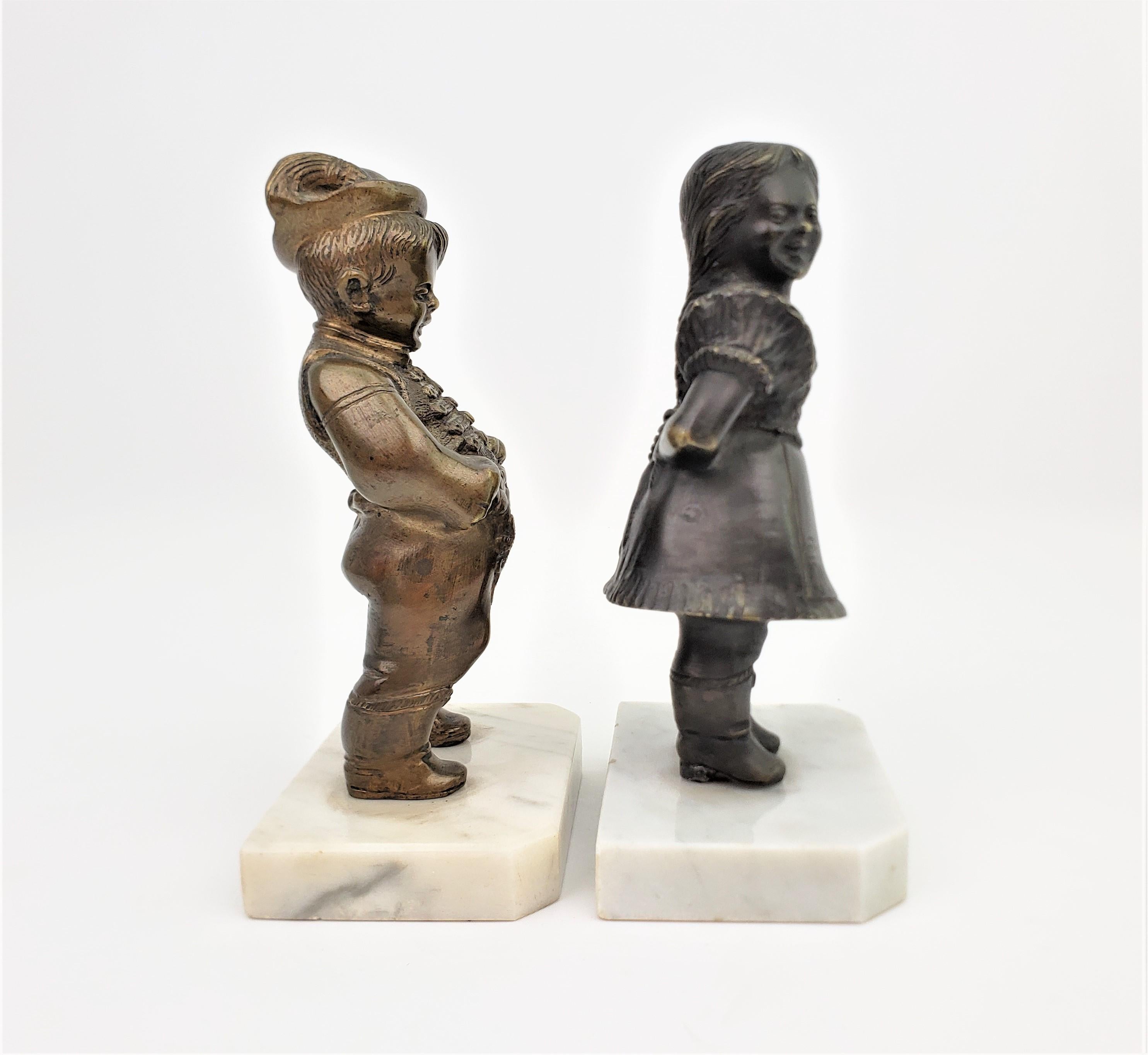 Austrian Antique Art Deco Bronze Figural Male & Female Character Sculptural Bookends For Sale