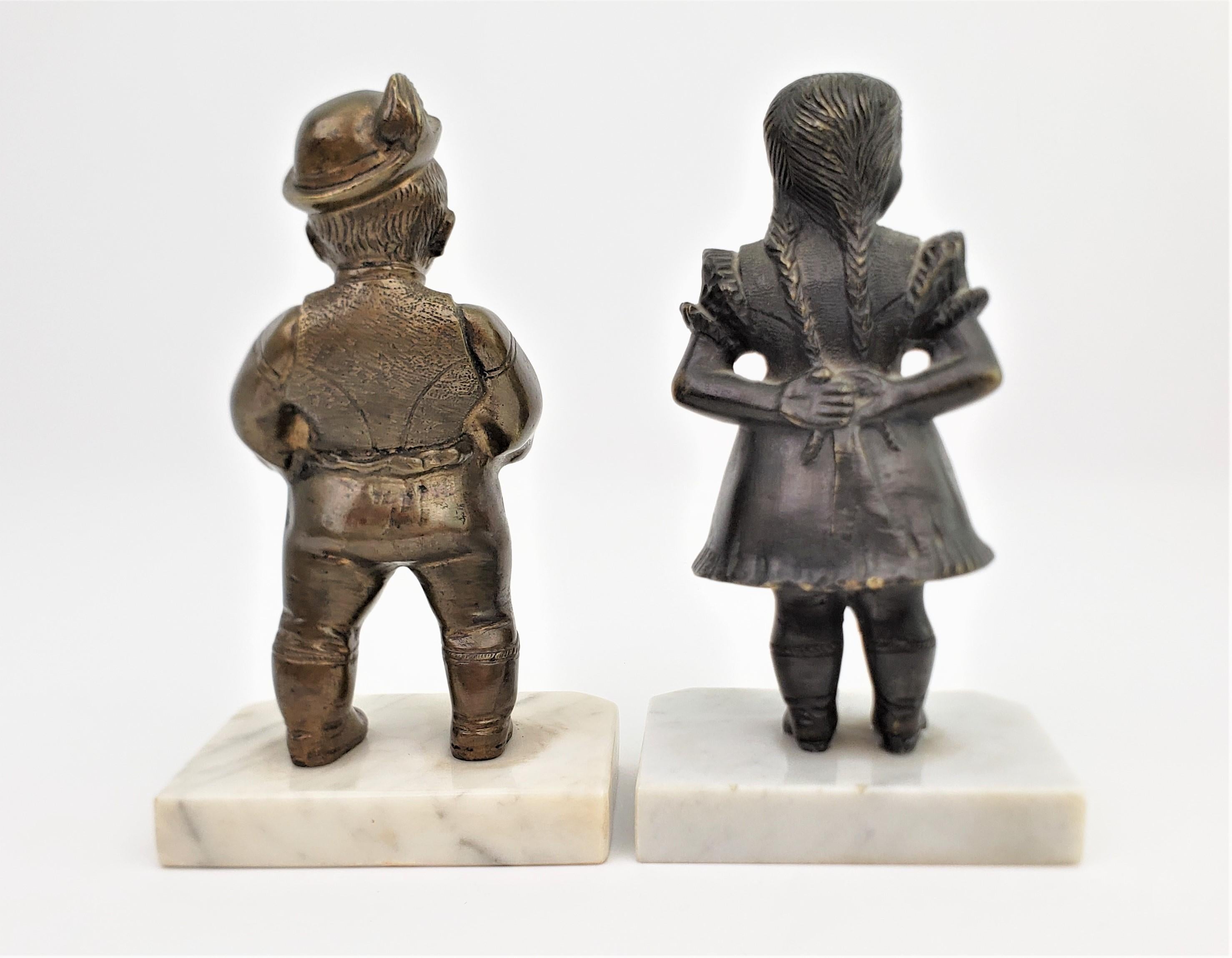 Cast Antique Art Deco Bronze Figural Male & Female Character Sculptural Bookends For Sale