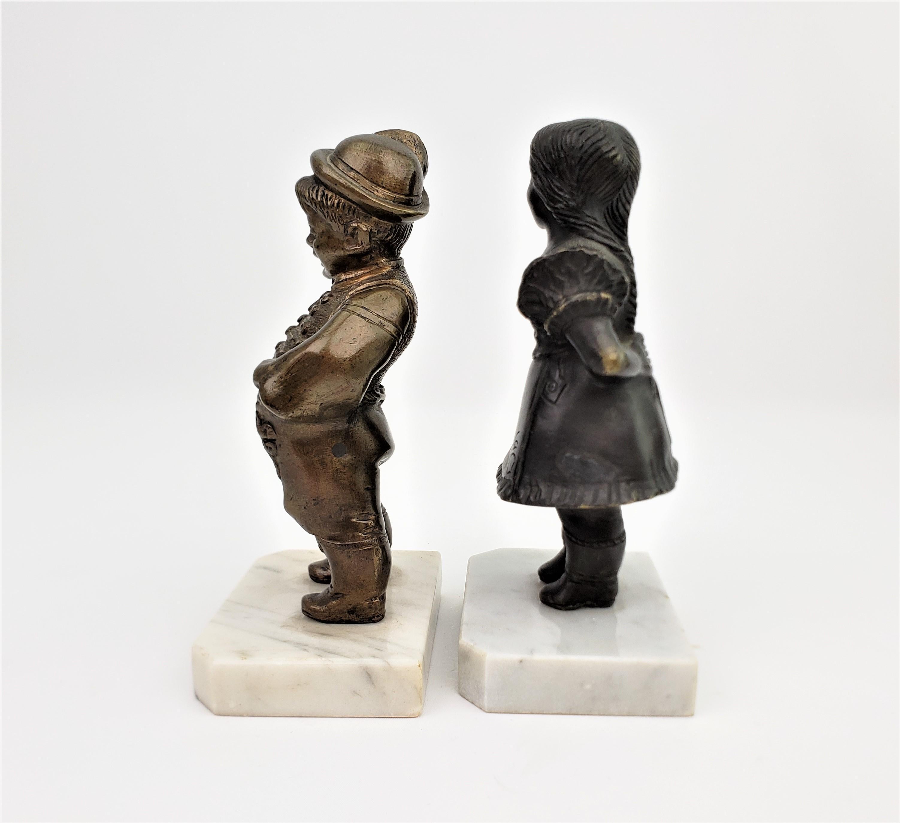 Antike Skulpturale Buchstützen aus Bronze mit männlichem und weiblichem Charakter, Art déco im Zustand „Gut“ im Angebot in Hamilton, Ontario