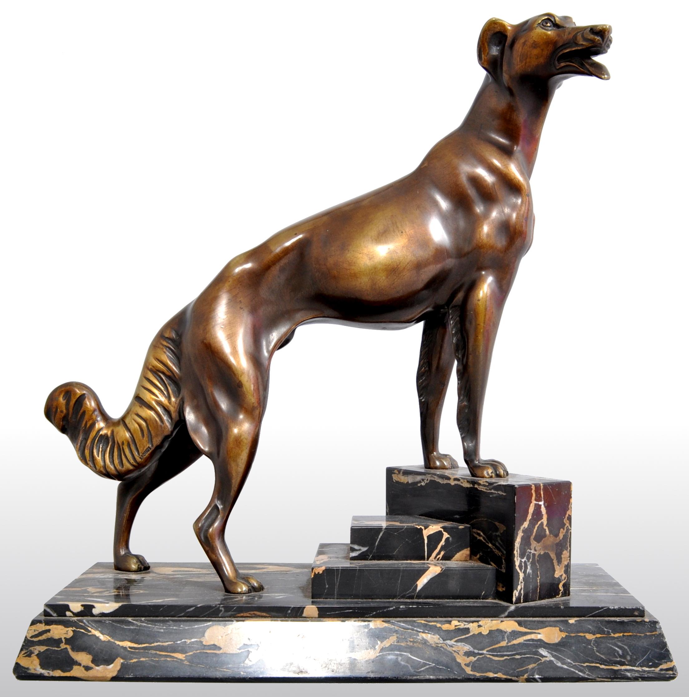 Antique Art Deco bronze Russian borzoi/wolfhound/dog by Louis-Albert Carvin (1875-1951). The bronze depicting a very handsome Russian Wolfhound (Borzoi), standing proudly on a stepped, veined plinth. The bronze signed on the plinth 