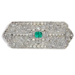 Art Déco circa 1925: Certified Emerald Diamond Natural Pearl White Gold Brooch
