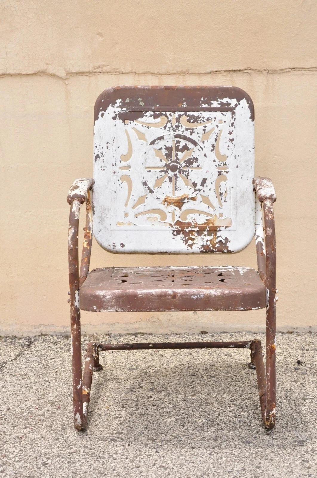 Please message us with your zip code to request a more reasonable domestic U.S. shipping quote.

Antique Art Deco Brown Distress Painted Bouncer Patio Porch Lounge Chair. Item features a steel metal bouncer frame, brown distress painted finish,