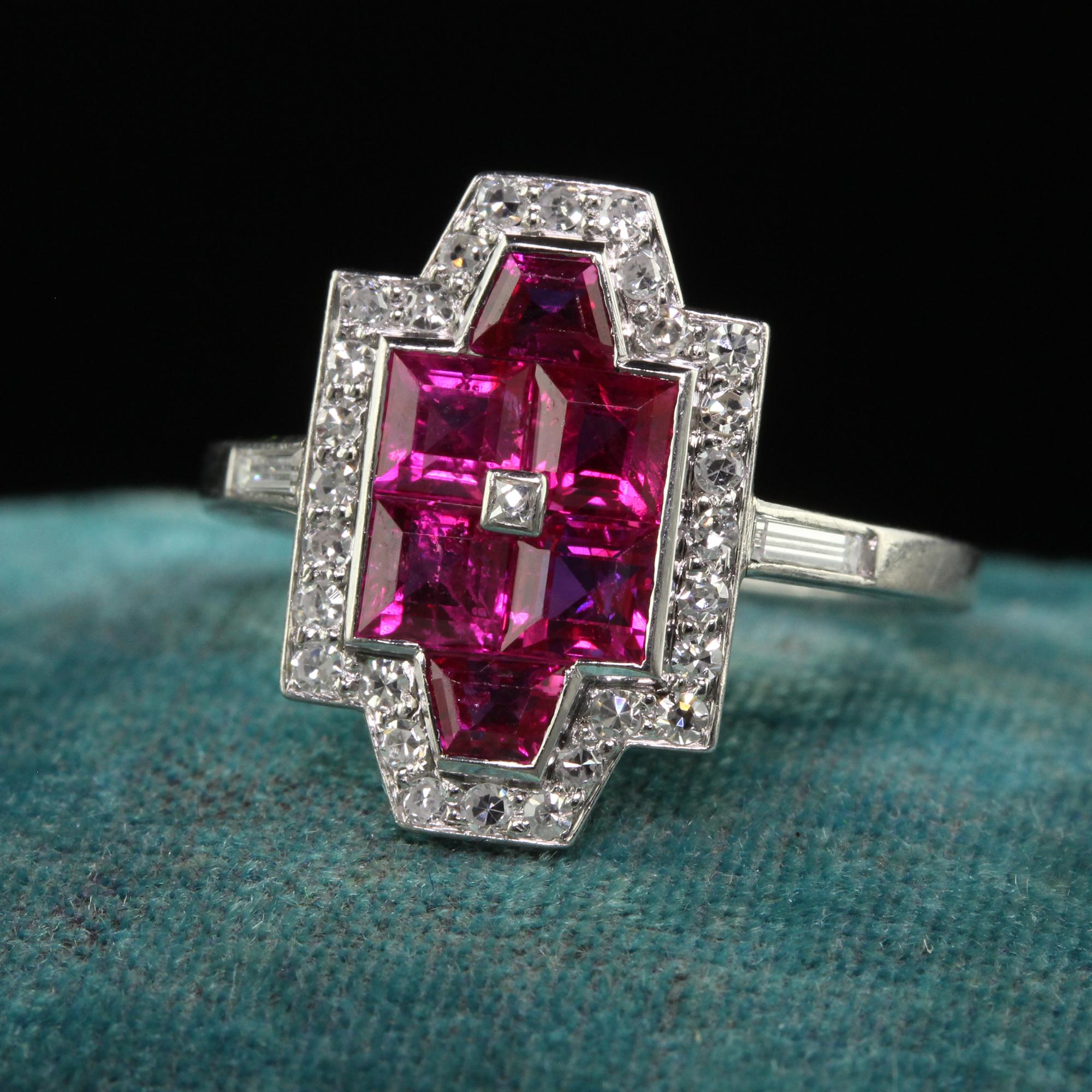 Beautiful Antique Art Deco Cartier Platinum Burmese Ruby and Diamond Ring. This unbelievable Cartier ring is crafted in platinum. The top of the ring holds natural square cut Burmese rubies that has a single cut diamond halo around the border. The