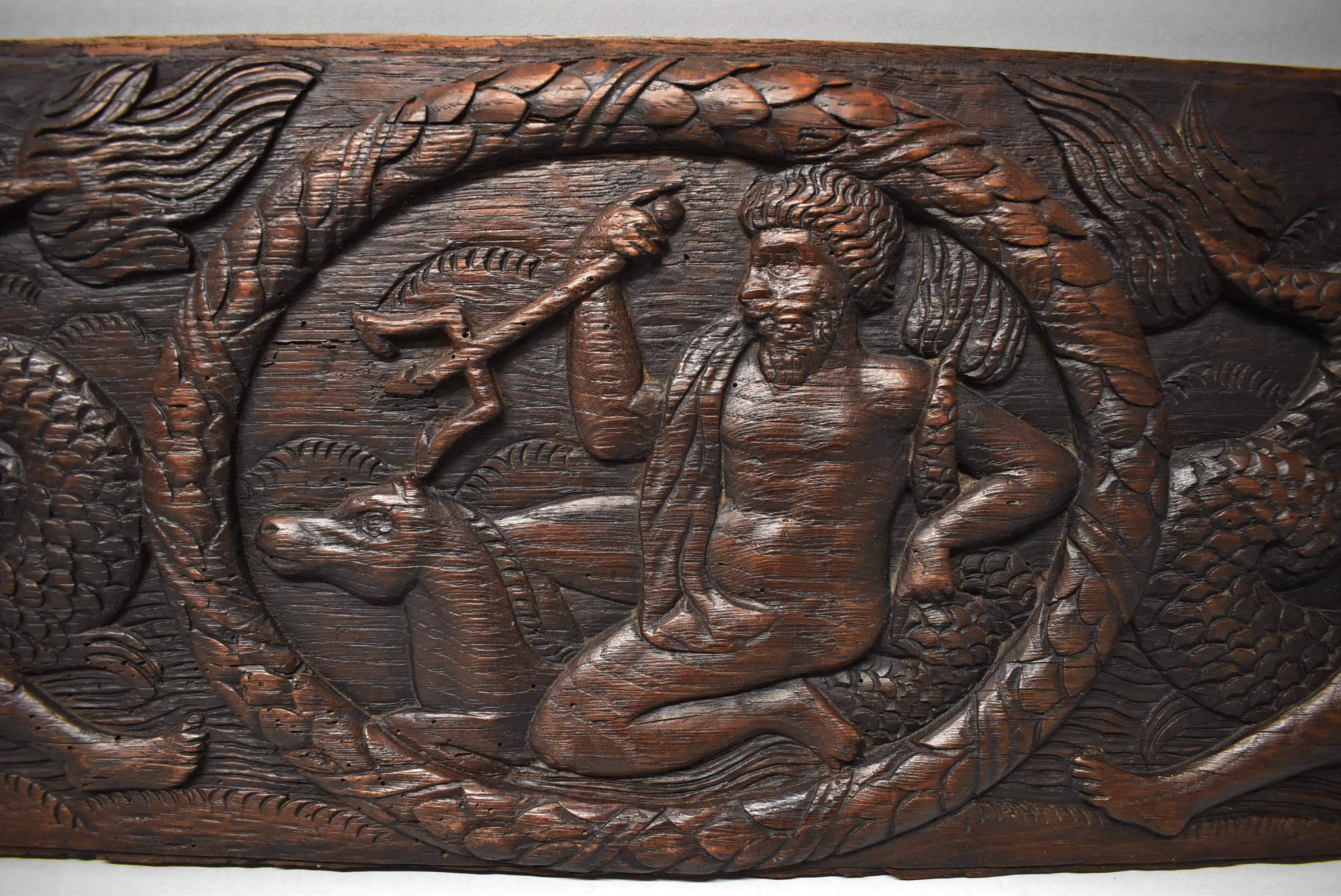 Antique Art Deco carved oak panel of Neptune and sea serpent. Measures: 34.5