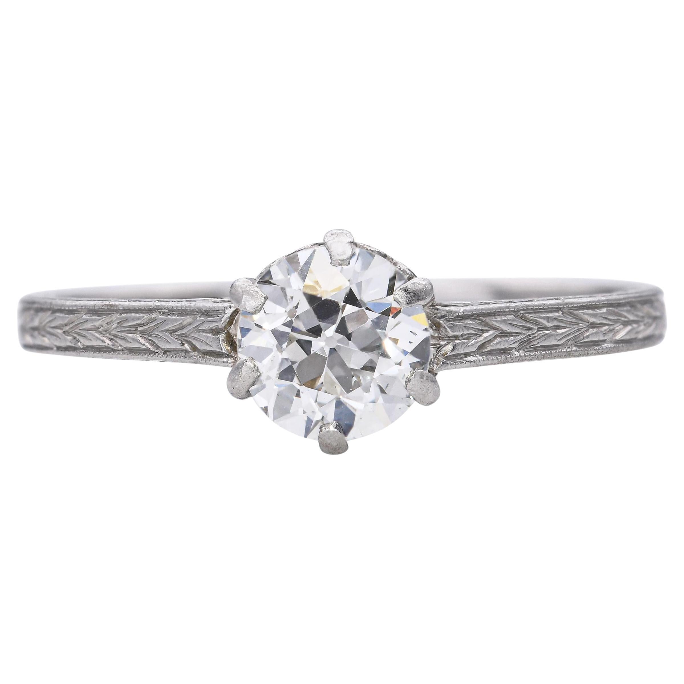 Antique Art Deco Carved Platinum 0.73ct Old European Cut Diamond Engagement Ring For Sale