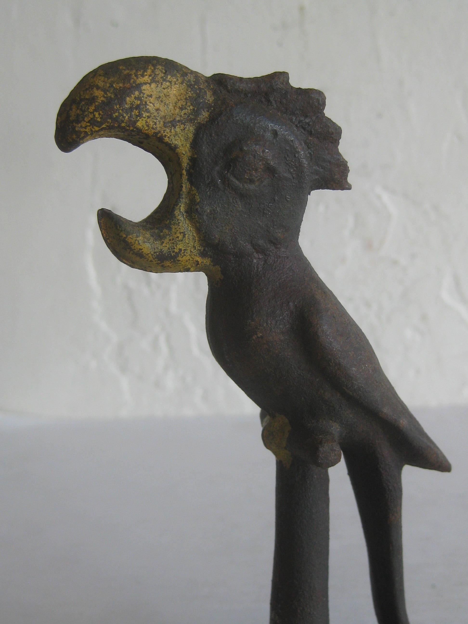 Wonderful antique Art Deco figural parrot bird bar bottle opener. Made of cast iron and has the remains of the original cold paint. Great detail and form. No broken parts or cracks. Measures approx. 5 1/2