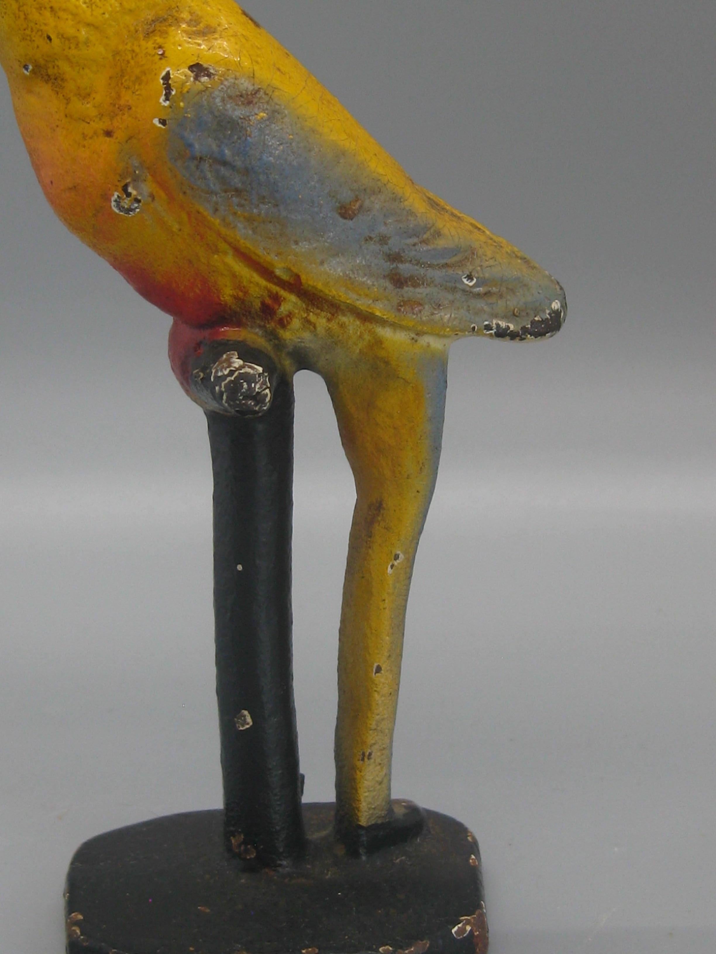 antique cast iron parrot bottle opener