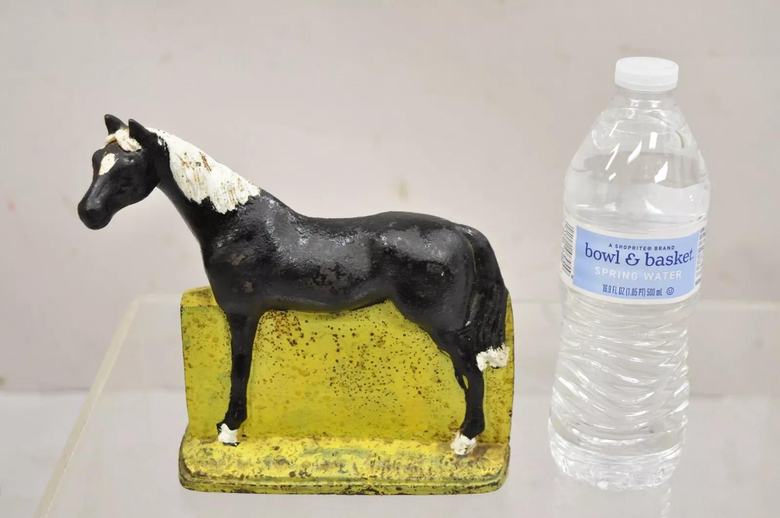 Antique Art Deco Cast Iron Figural Horse Form Black & Yellow Doorstop. Weighs approx 10 lbs. Circa Early 20th Century. Measurements: 7