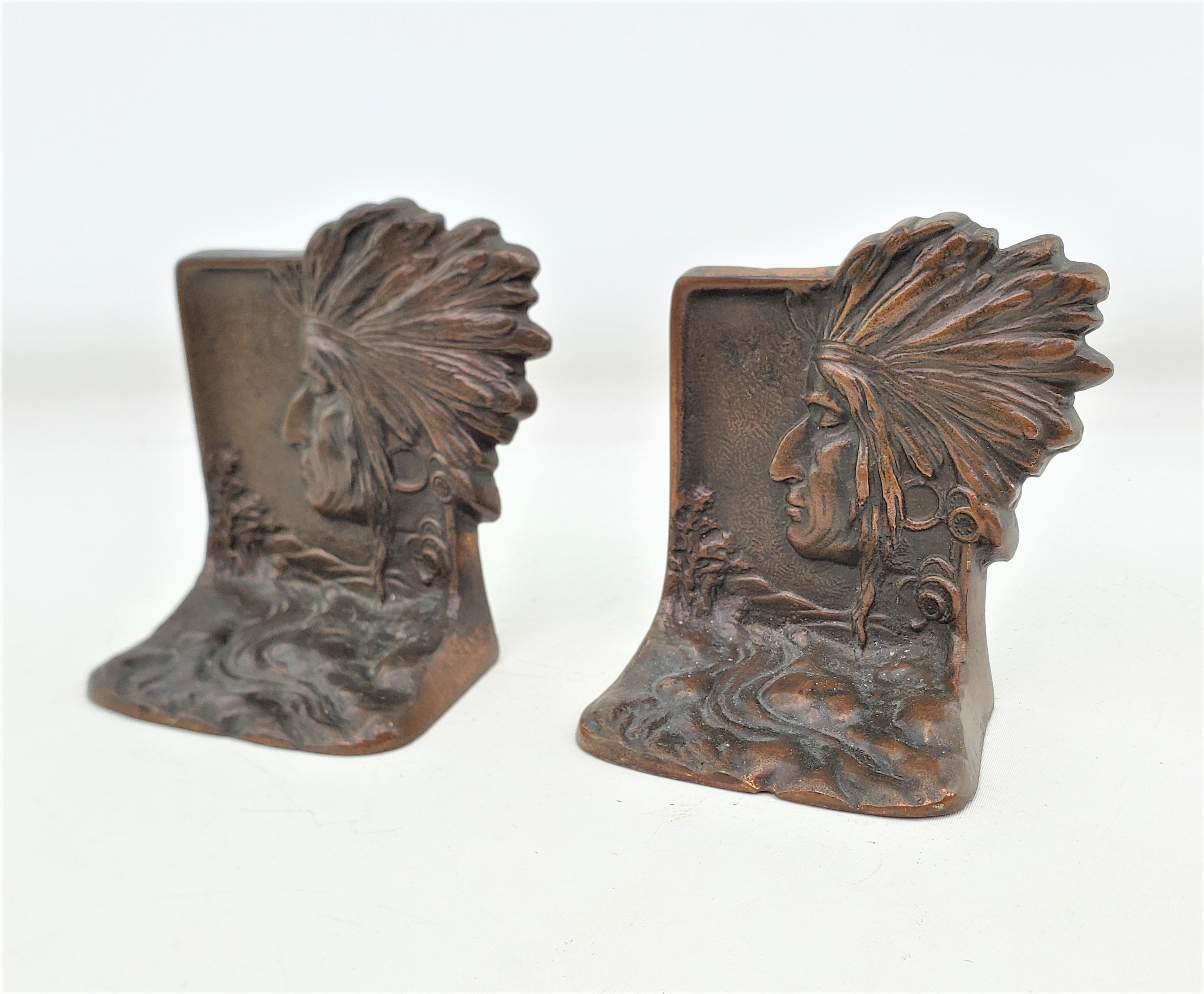 Antique Art Deco Cast & Patinated Bookends Depicting an Indigenous Warrior In Good Condition For Sale In Hamilton, Ontario