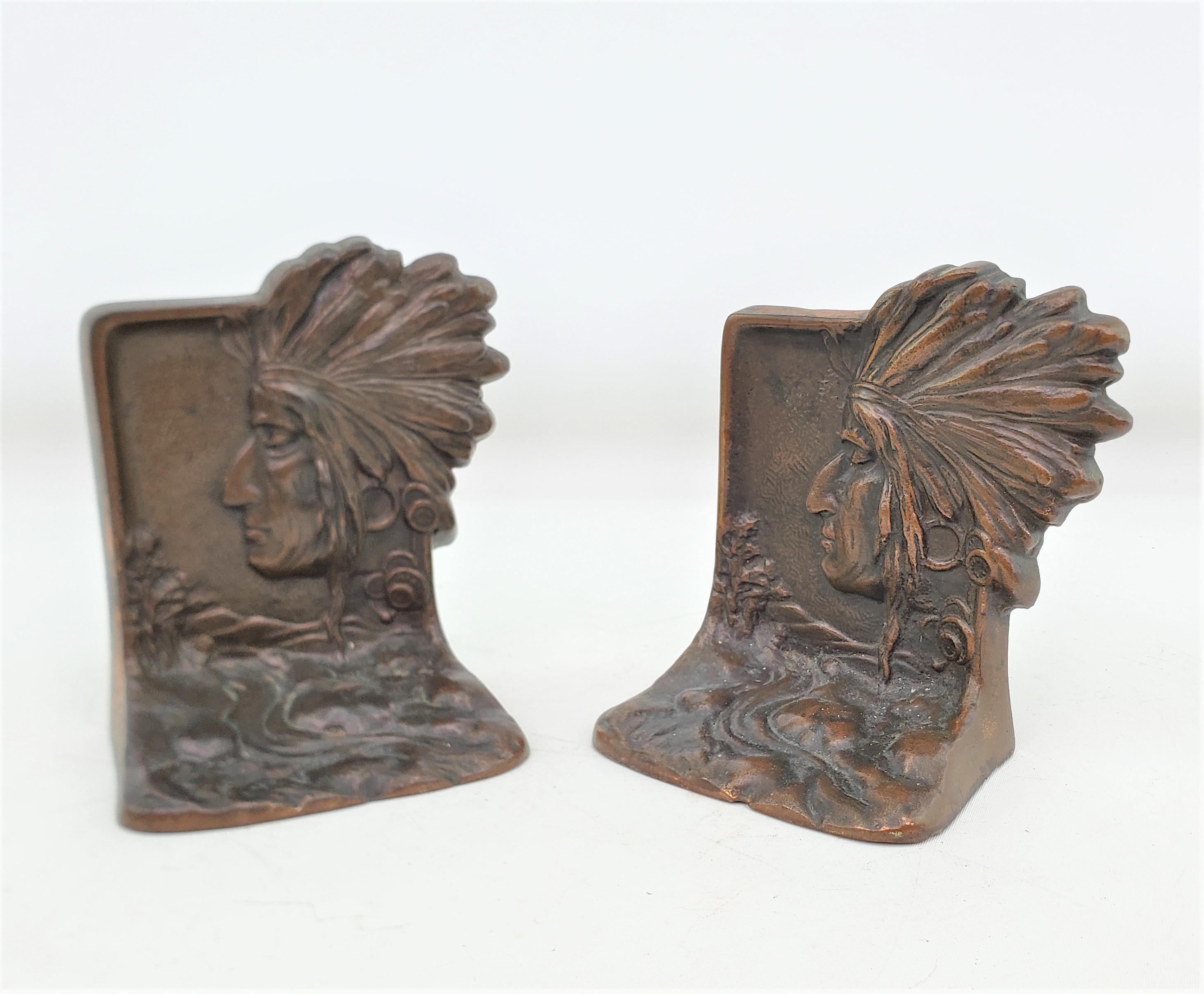 20th Century Antique Art Deco Cast & Patinated Bookends Depicting an Indigenous Warrior For Sale