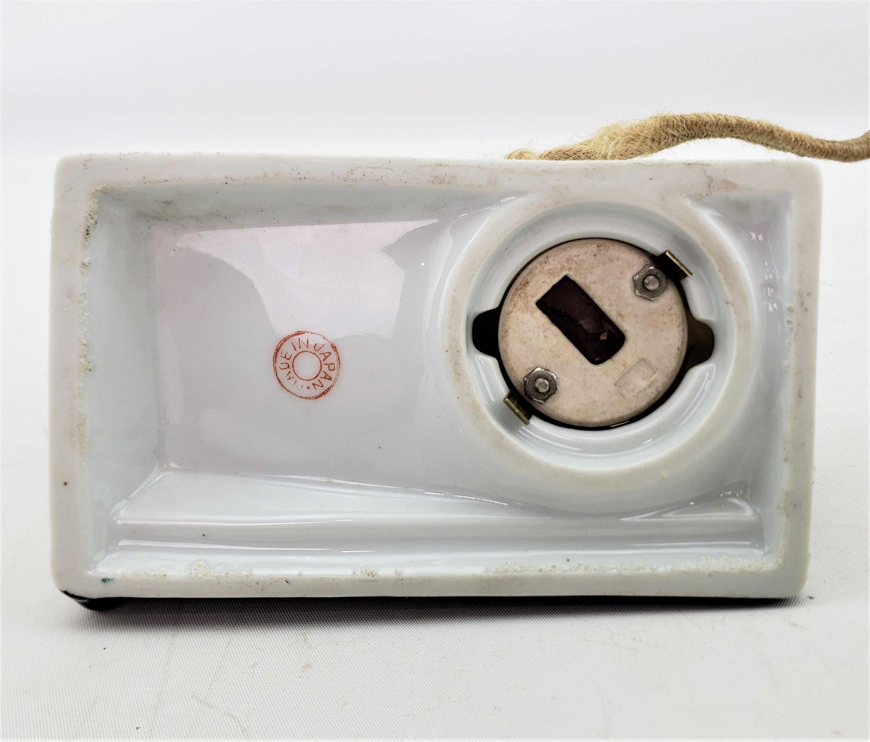 20th Century Antique Art Deco Ceramic Perfume Table Light with Seated Asian Female & Flowers For Sale
