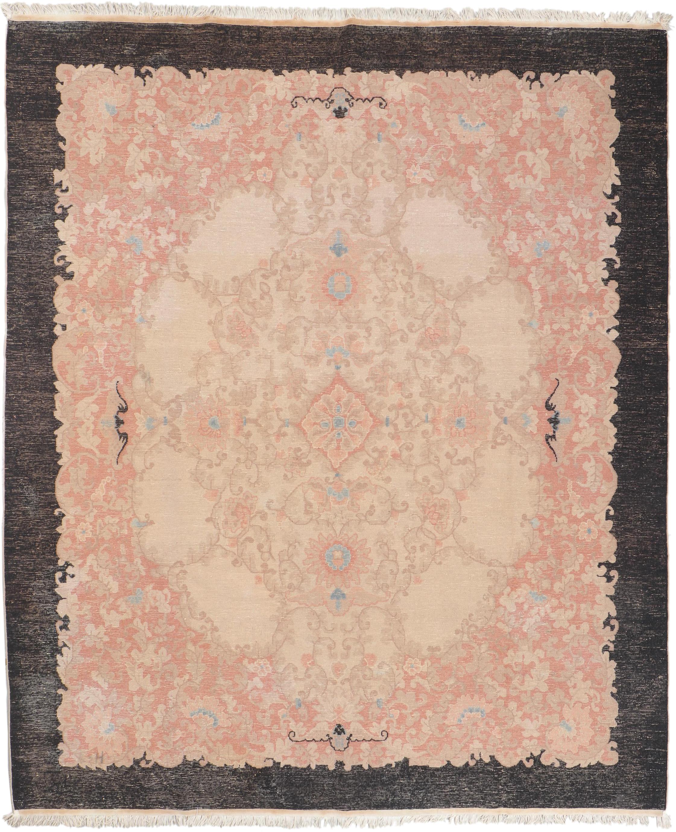 A superb example of Art Deco weaving originating from China for the Western market. Finely knotted with silky wool with a floppy yet sturdy handle, a characteristic of the Fette-Li carpet workshop. Helen Fette went to China as a missionary, selling