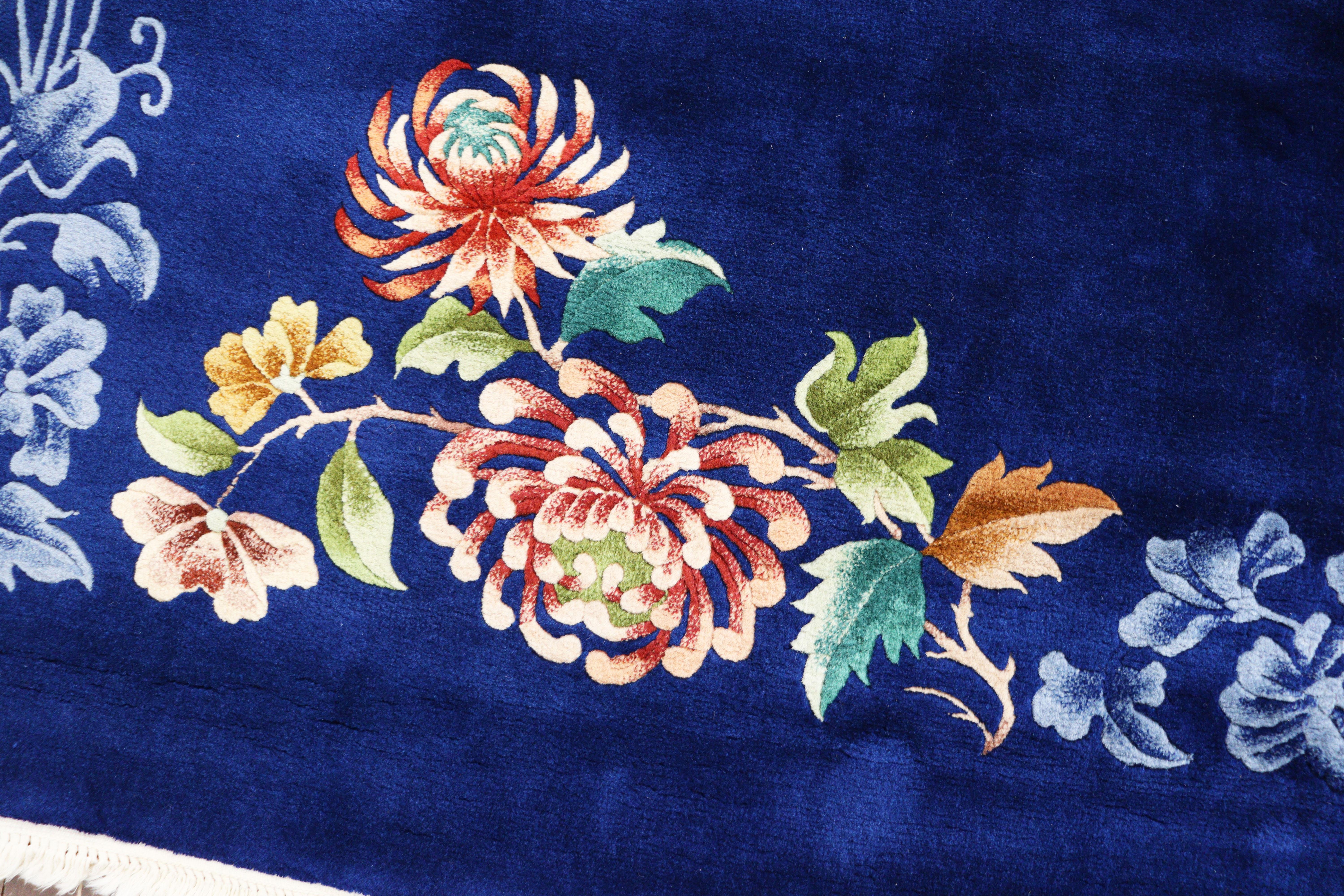 Vintage/Antique handmade Art Deco Chinese carpet, perfect natural dyed Blue background color. c-1940, traditionally floral Design on two corners, rectangular shape. In excellent condition.
Most wonderful Art Deco carpet was made in China, starting