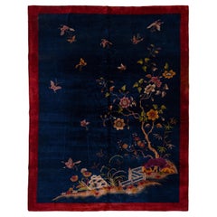 Tapis chinois ancien Art Déco en laine bleue à fleurs, fait à la main