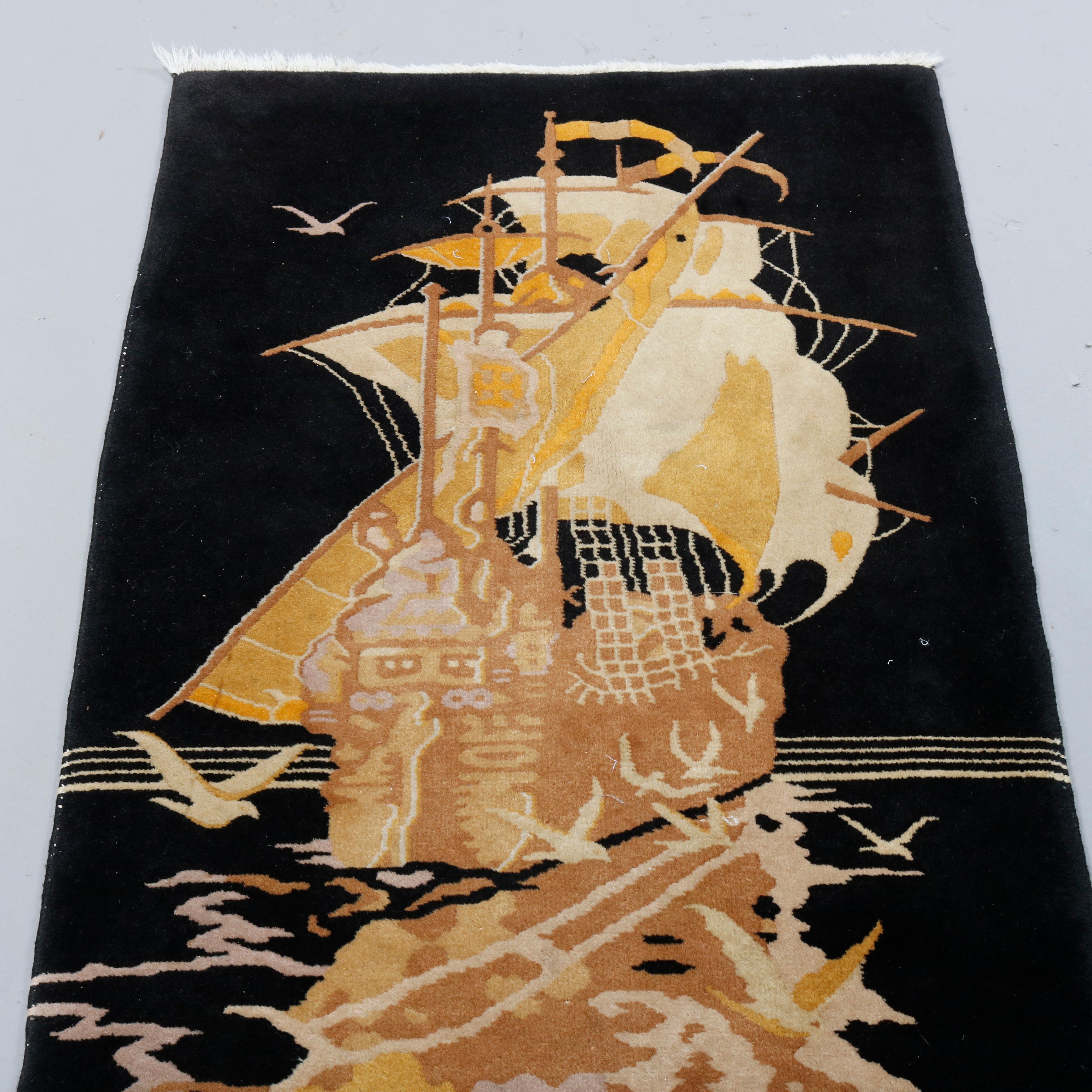 An antique Art Deco pictorial Chinese Nichols rug offers wool construction with design having maritime scene with tall mast ship, c1930.

Measures: 53