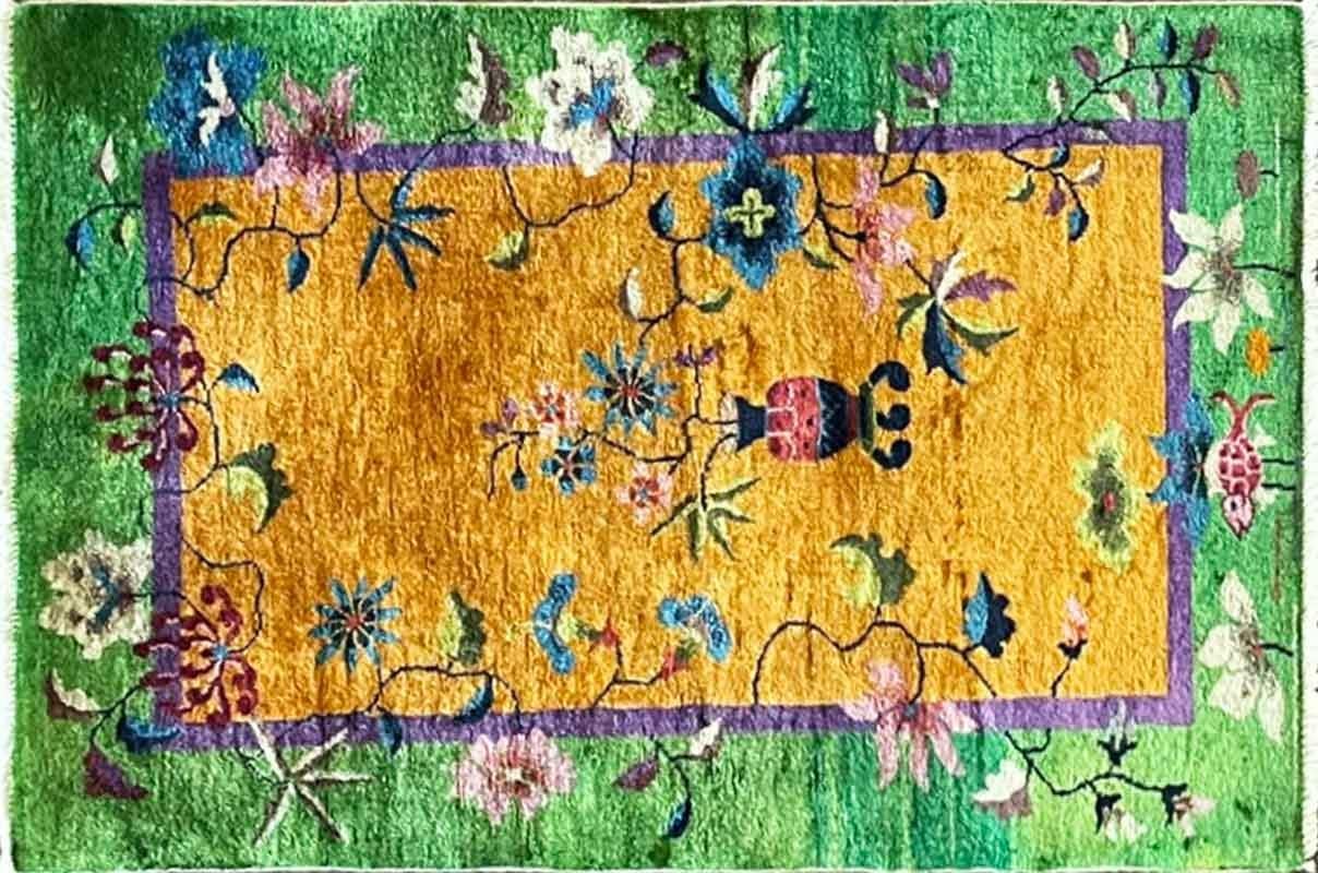 Ask me regarding the best way of shipping it to you.
Welcome to the captivating allure of the art deco Chinese rug from the 1920's, where the past intertwines with the present, and where artistry finds its home in your  heart and home. This antique