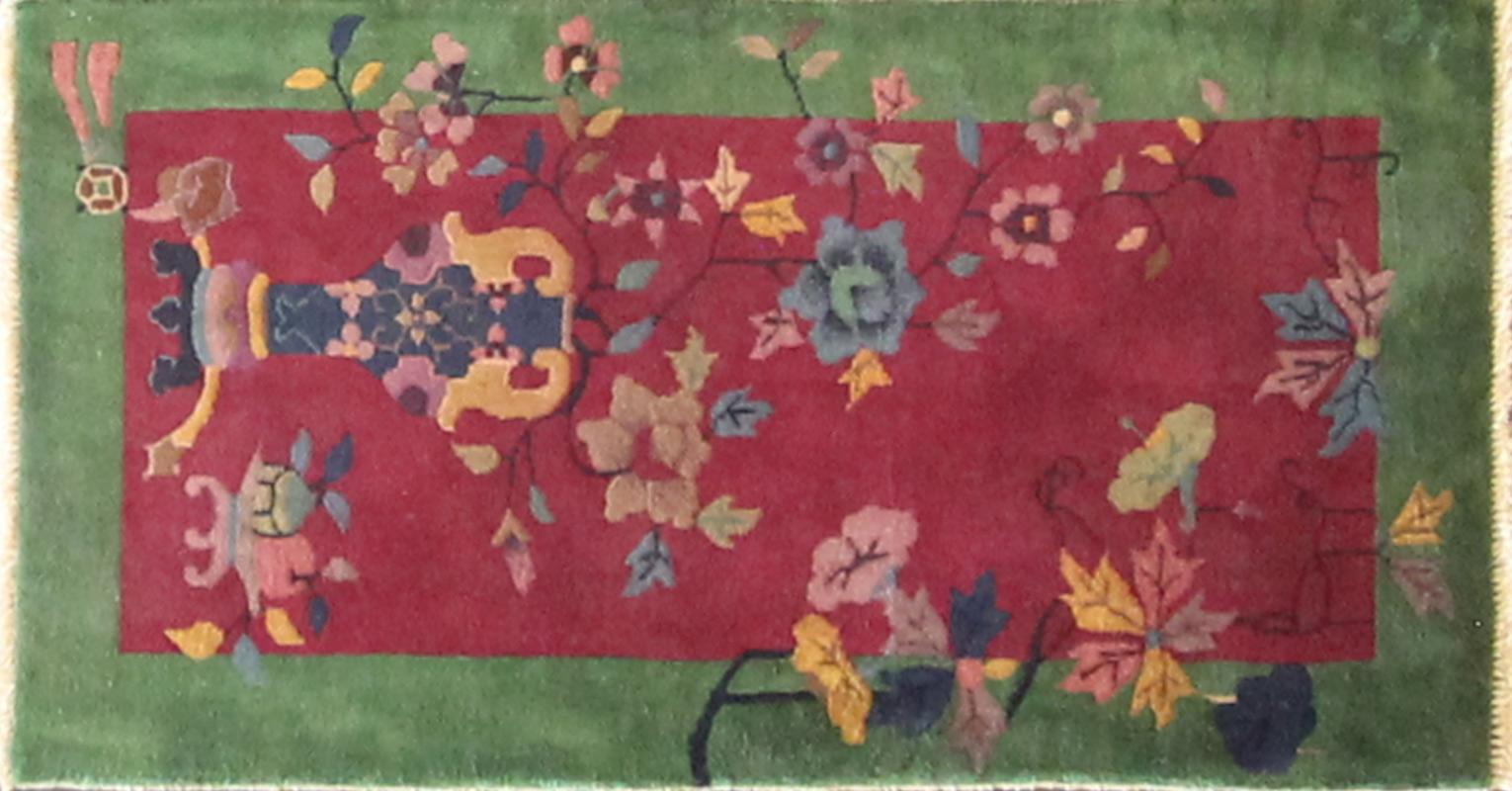 Antique Art Deco Chinese Rug, Chinese Art, 2' x 4', c-1920's
It's hard not noticing this rug, the beauty of the green and red colors background  and traditional floral and vase design in multi color. it's condition is excellent . The ends and sides