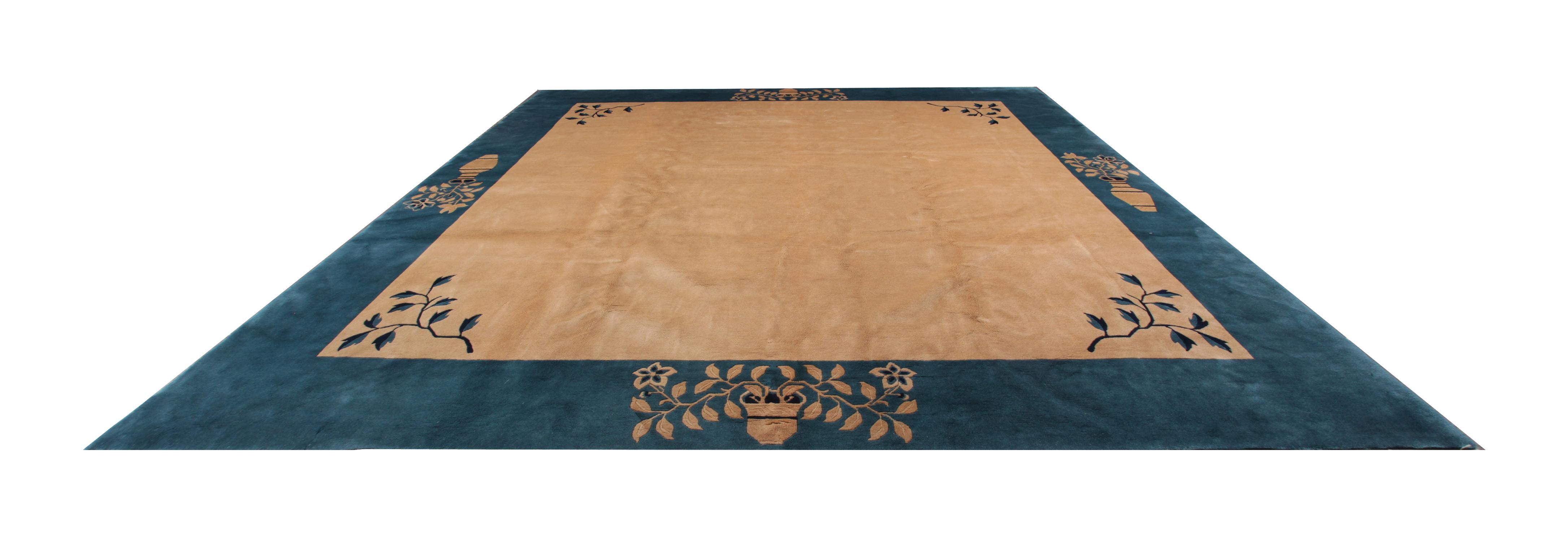 This wool rug is one the unusual rugs of the 1920s which are Art Deco rugs in the most excellent condition with Ivory background color contrasting the turquoise blue or shadow of navy in border and the motives. This patterned rug is a combination of